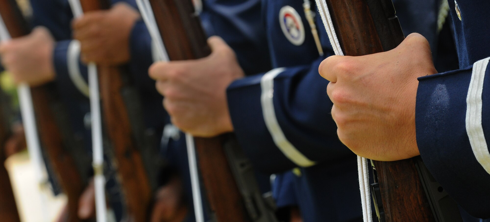 MOODY AIR FORCE BASE, Ga. --The Moody Honor Guard gives military honors by form of a 21-gun salute to Staff Sgt. Stephanie Farmer during her memorial service here June 11. Sergeant Farmer served eight years in the Air Force before she passed away on May 30, 2010. (U.S. Air Force photo by Airman 1st Class Benjamin Wiseman/RELEASED)