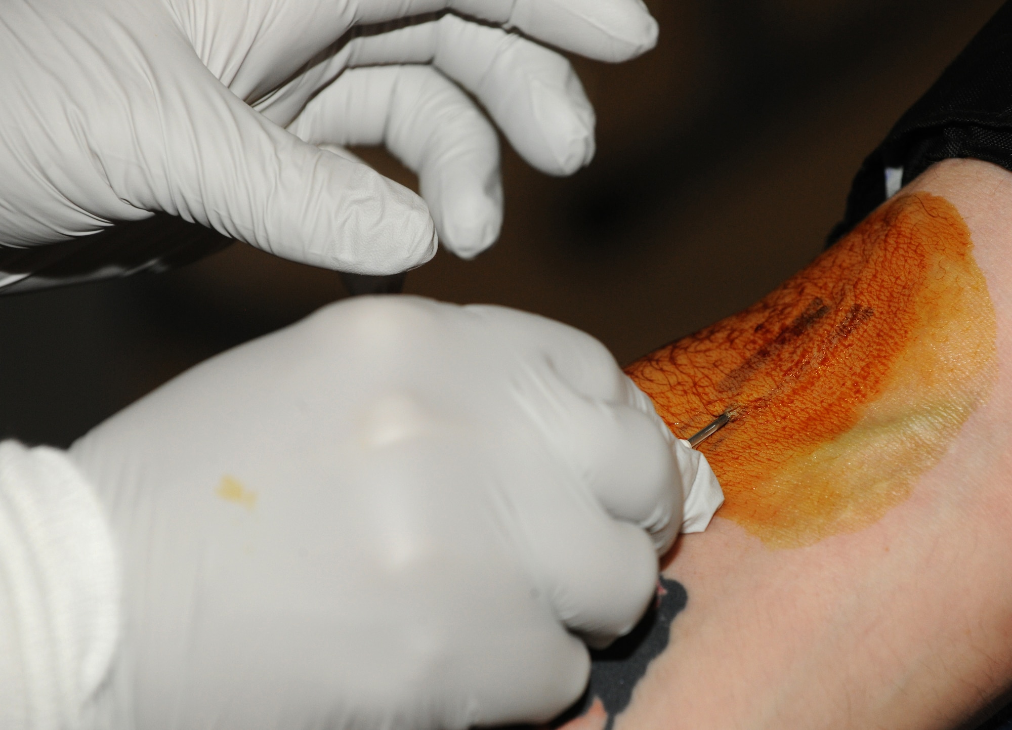 MOODY AIR FORCE BASE, Ga. -- A 16-gauge needle is used to draw blood from donors  during a blood drive here June 11. Members from all around Moody came to donate blood to the American Red Cross. (U.S. Air Force photo by Airman 1st Class Benjamin Wiseman/RELEASED)