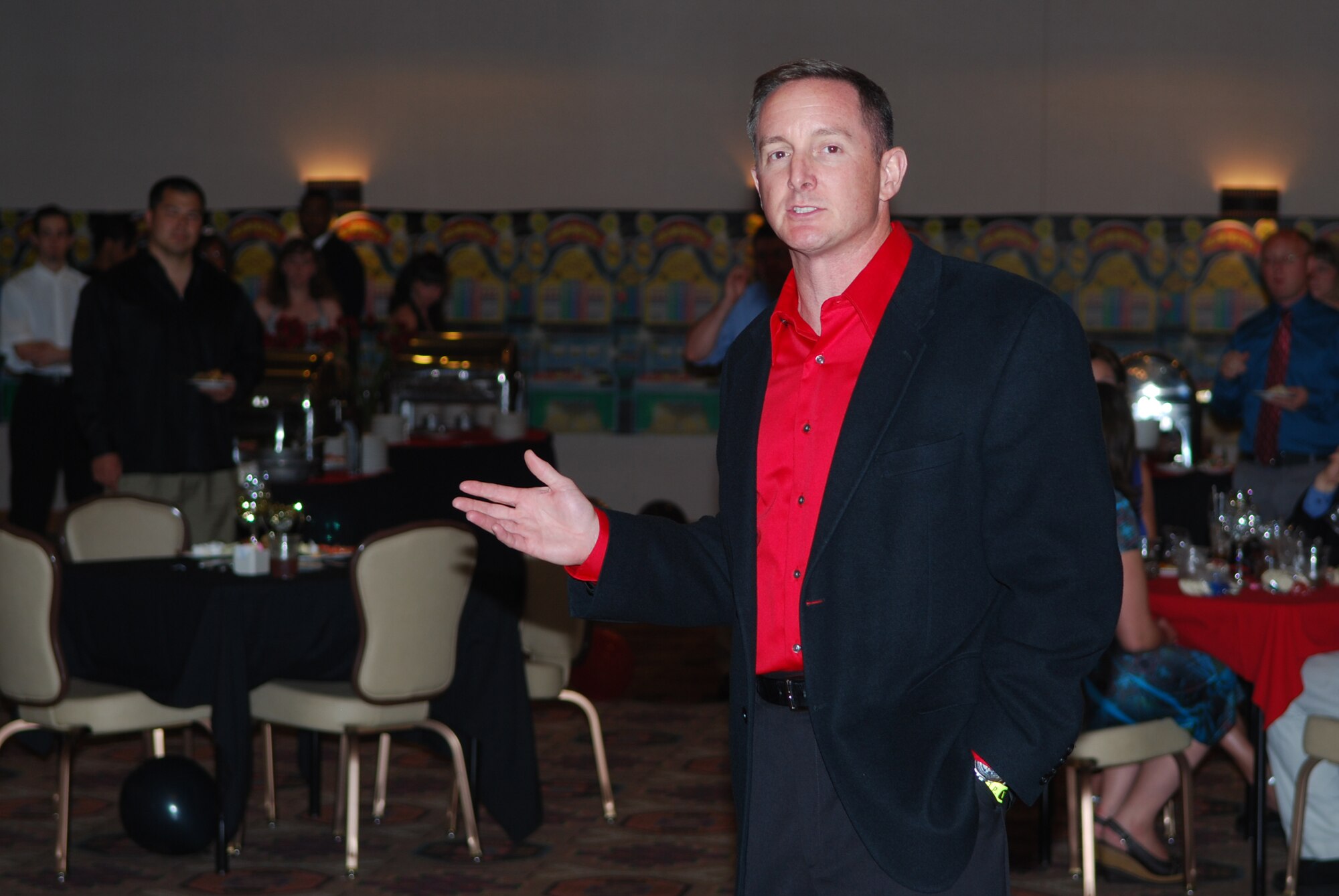 Col. Stephen Clark, 27th Special Operations Wing commander, speaks at the beginning ot the Cannon Air Force Base Spring formal event June 12, 2010. The Spring Formal gave Cannon airmen and dependents the chance to dress up, have fun, and enjoy dancing and games. (US Air Force Photo by Master Sgt. Carlotta Holley) 