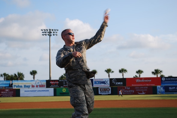 1st Lt Karl Wiest, 45th Space Wing, throws out first pitch
