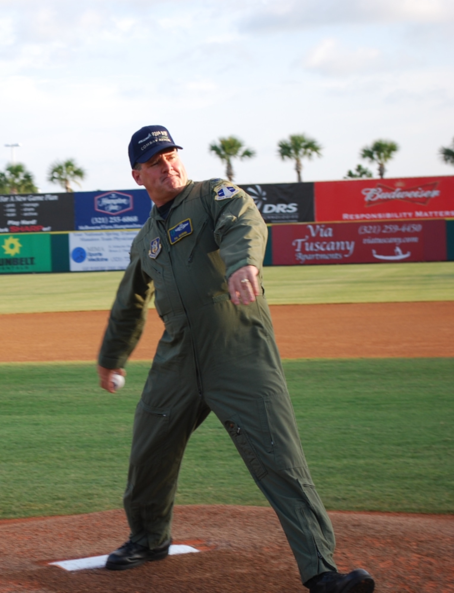 Col Philip Manning, vice commander, 920th Rescue Wing, throws out first pitch.