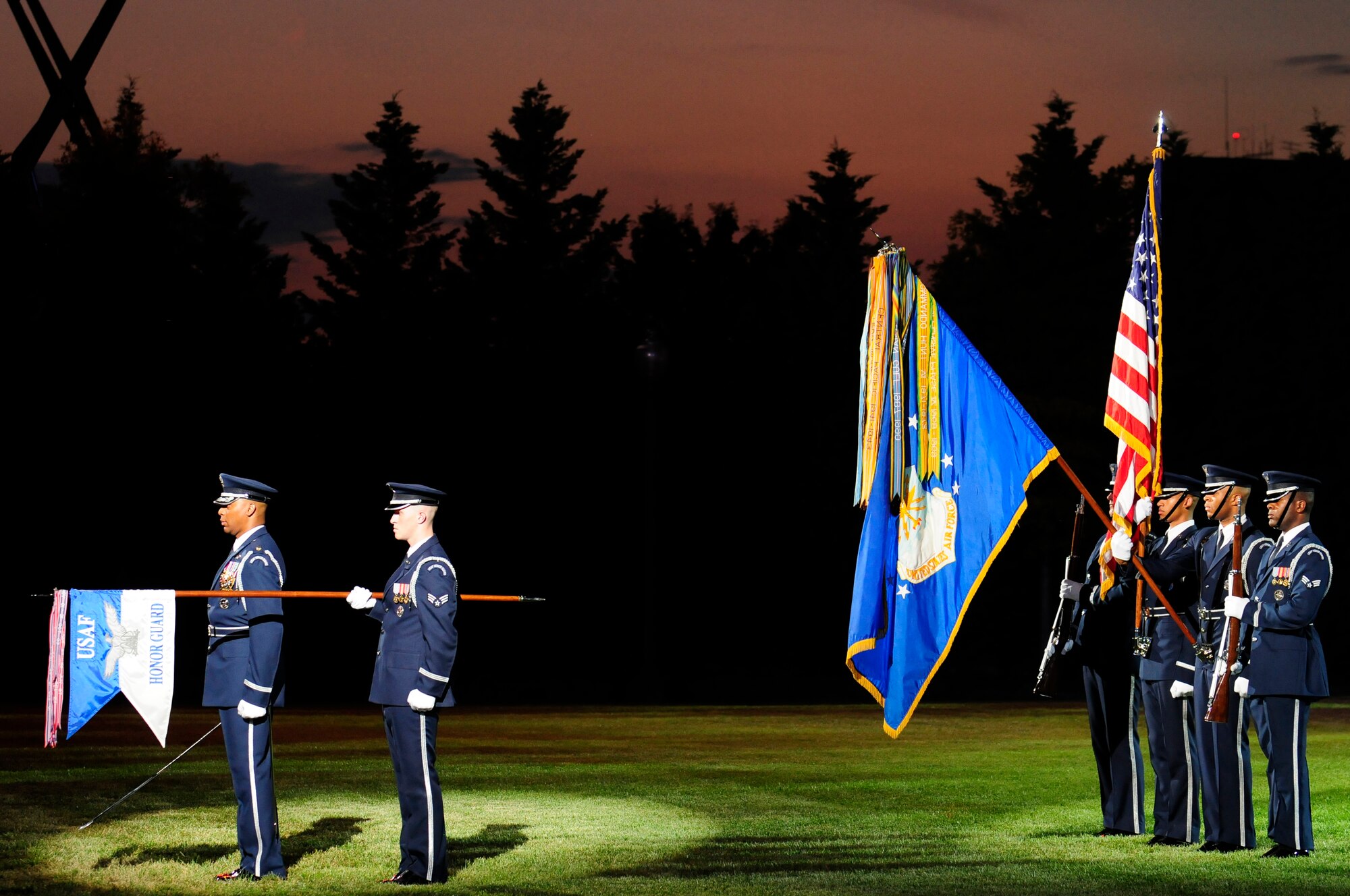 A United States Air Force color guard element presents the colors during the Conference of American Air Chiefs Twilight Tatoo June 13th at the U.S. Air Force Ceremonial Lawn on Bolling Air Force Base. Gen Norton A. Schwartz, U.S. Air Force chief of staff, hosted the event celebrating "50 Years of Friendship and Cooperation" between nations belonging to the System of Cooperation among American Air Forces. (U.S. Air Force photo by Staff Sgt. Raymond Mills)