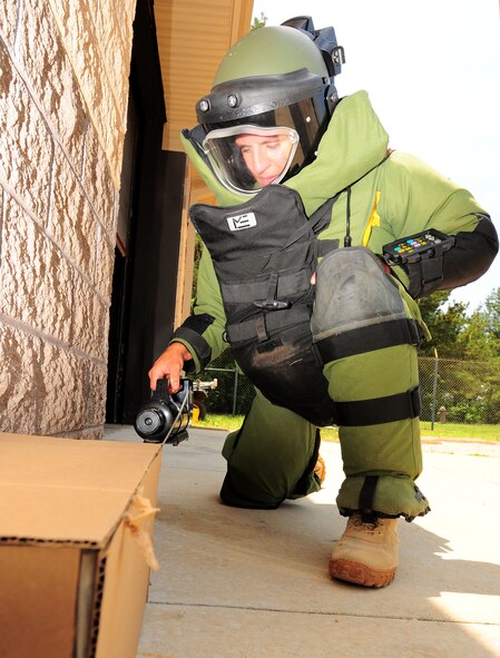 SHAW AIR FORCE BASE, S.C. -- Senior Airman Joshua Labott, 20th Explosive Ordnance Disposal apprentice, demonstrates techniques on disabling a suspicious package June 11, 2010. Airman Labott received the Bronze Star with the "V" for valor along with a Purple Heart for his actions in Afghanistan. (U.S. Air Force photo/Senior Airman David Minor)