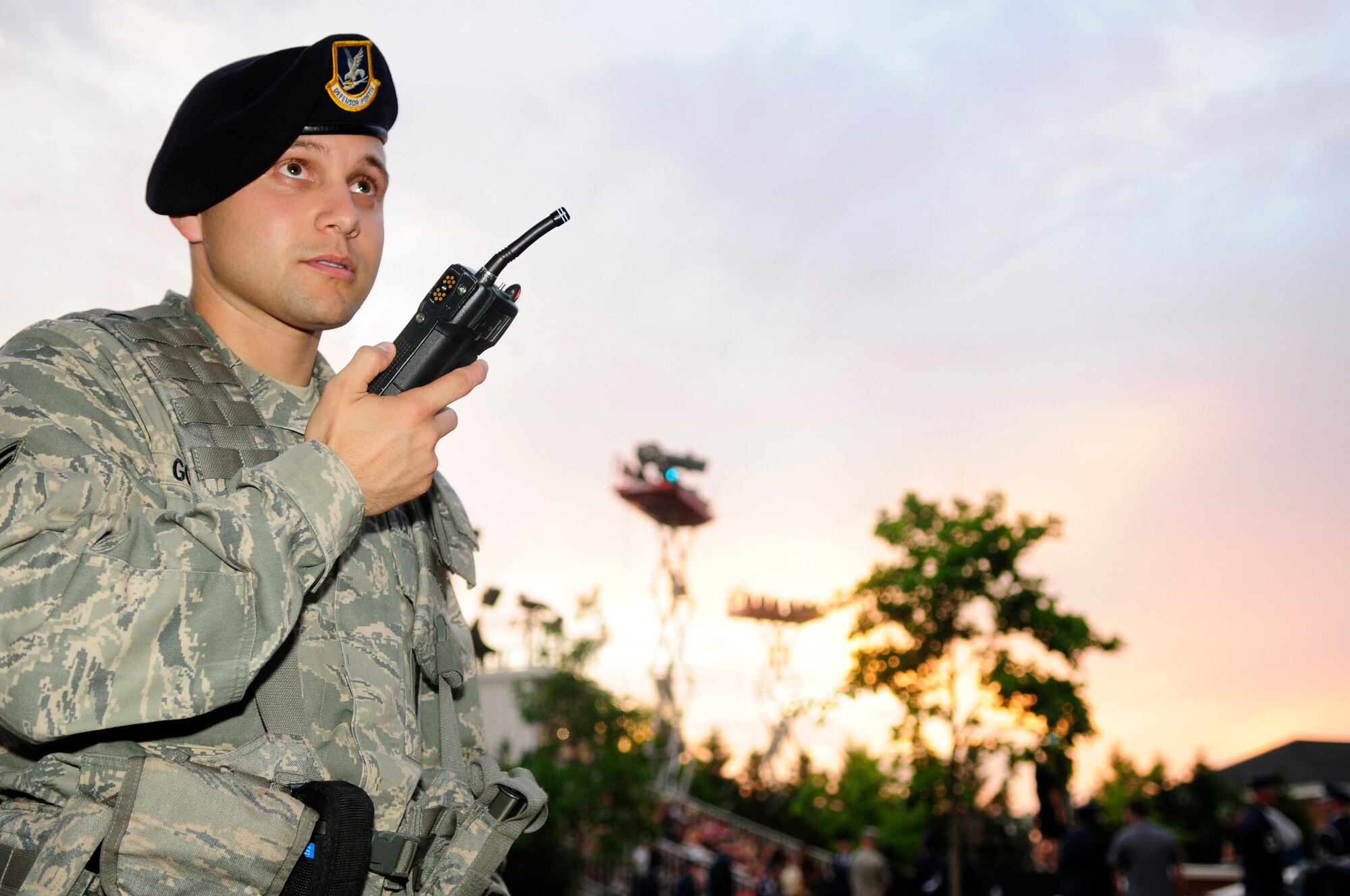 Airman 1st Class Benjamin Gonzalez, 11th Security Forces Squadron, mans a checkpoint at the U.S. Air Force Ceremonial Lawn June 12 during the Twilight Tattoo dress rehearsal. While spectators enjoyed performances by the U.S. Air Force Honor Guard and Band, numerous other supporting organizations worked behind the scenes. (U.S. Air Force photo by Staff Sgt. Raymond Mills)