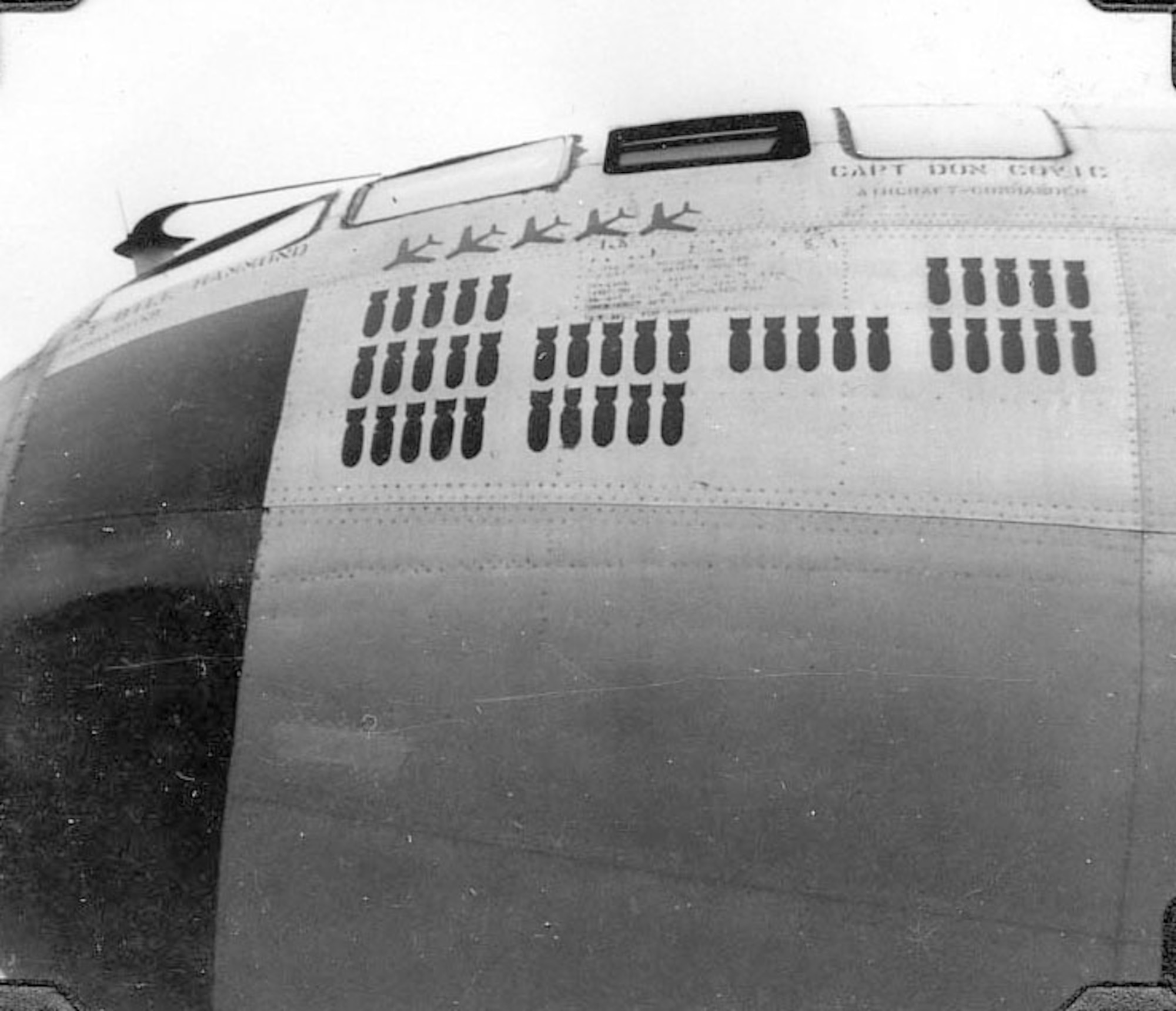 "Command Decision" had nose art on the left side showing its five MiG kills.  Each painted bomb represented a mission. (U.S. Air Force photo)