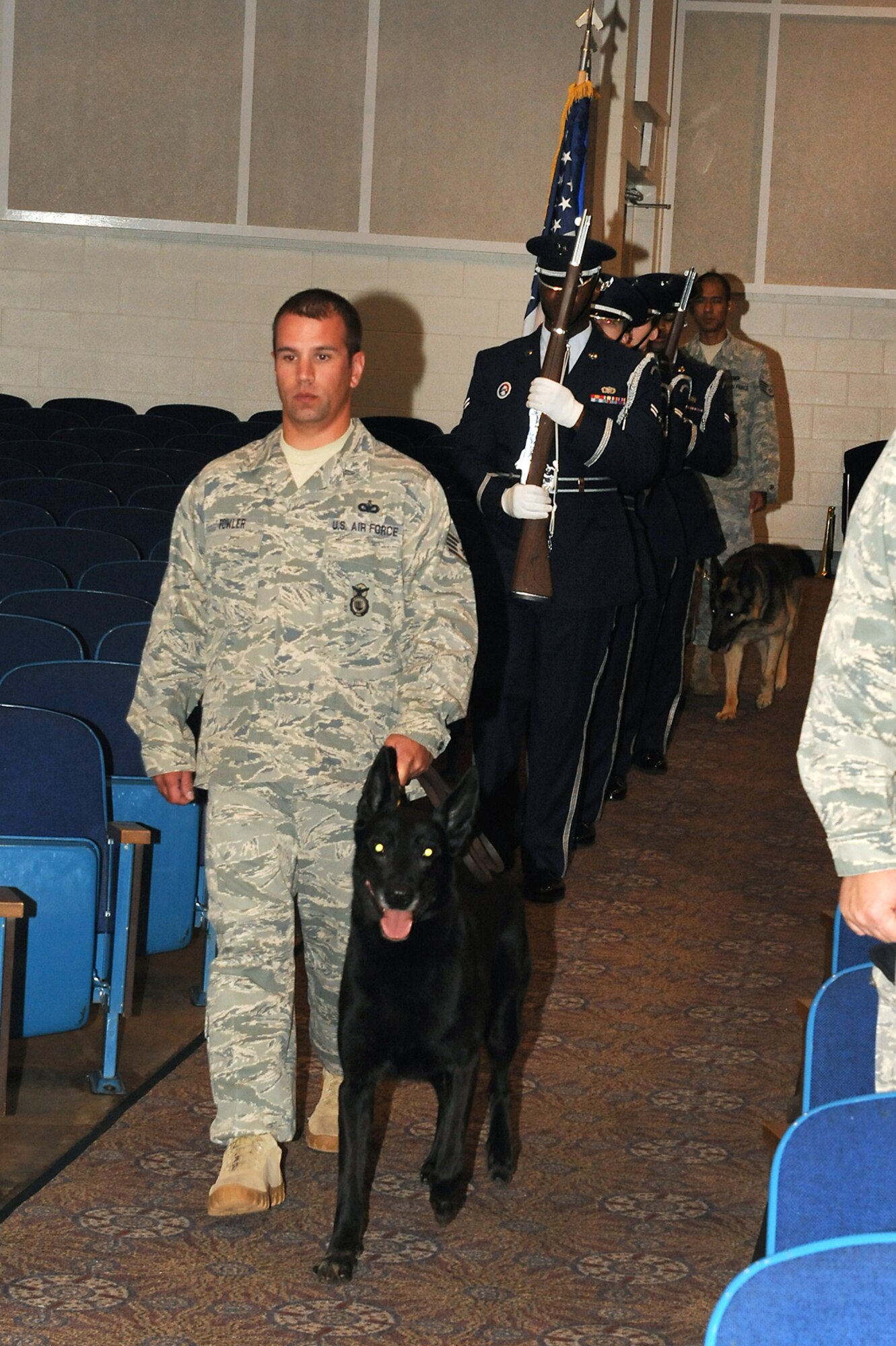 Airmen present the colors during the 21st Security Forces Squadron military working dog retirement and memorial ceremony June 8 at Peterson AFB. (U.S. Air Force photo/Roberta McDonald)