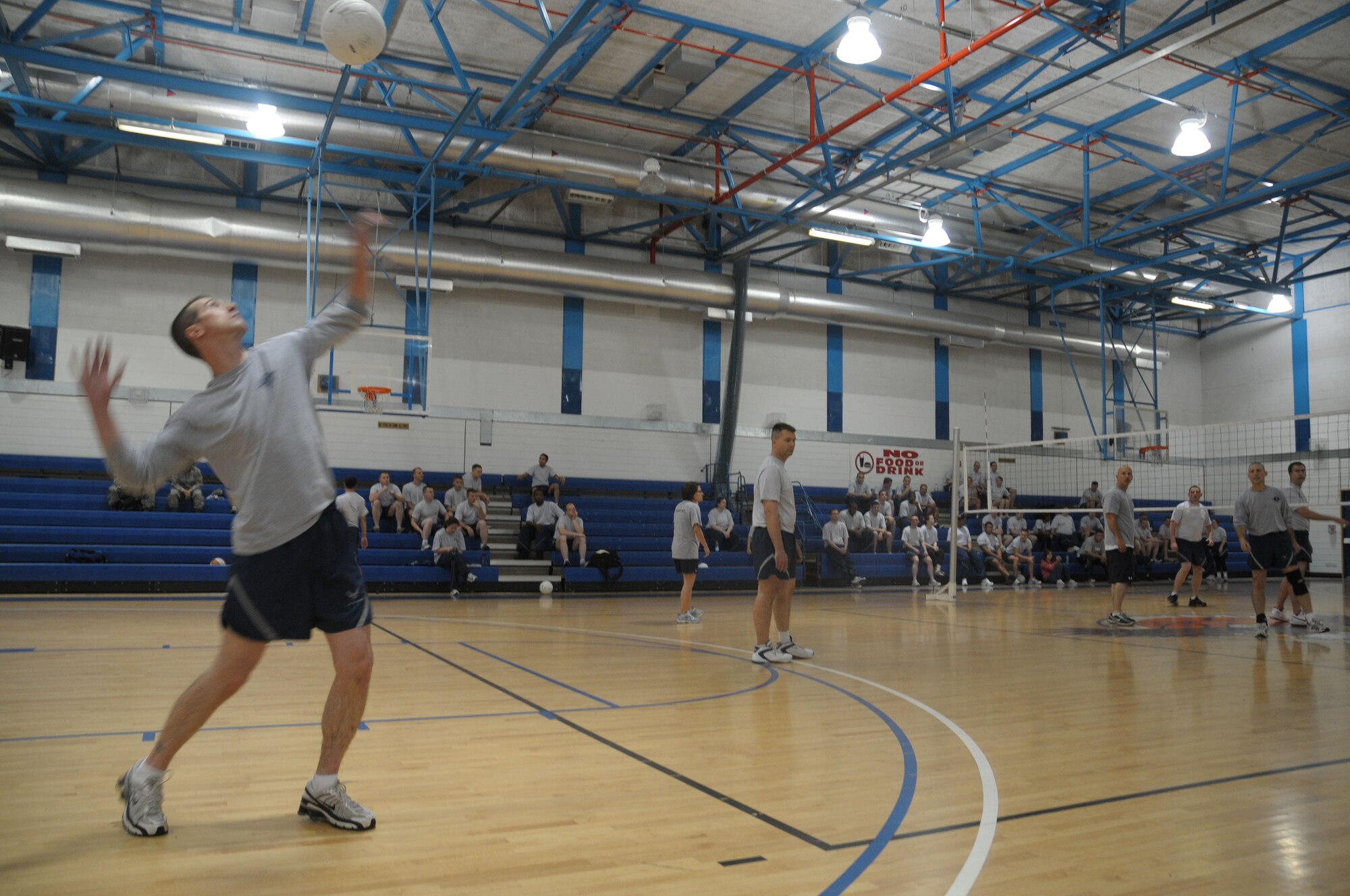 Master Sgt. Shane Sanders, 48th Logistics Readiness Squadron first sergeant, serves the ball to Airman Leadership School Class 10-F during a volleyball match at the RAF Lakenheath Fitness Center June 11. The first sergeants continued their winning ways beating ALS four games to none. It has become Lakenheath tradition for each ALS class to play volleyball against the first sergeants. (U.S. Air Force photo/Staff Sgt. Connor Estes)