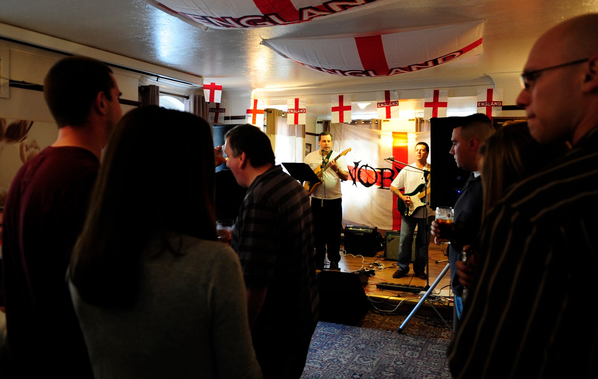 RAF MILDENHALL, England – Dave Golding, 100th Civil Engineer Squadron, and fellow band member Dave Felted entertain a modest audience at the Rose and Crown pub June 11.  Golding has played for 20 years, the last three-and-a-half of those being with Felted.  (U.S. Air Force photo/Staff Sgt. Christopher L. Ingersoll)