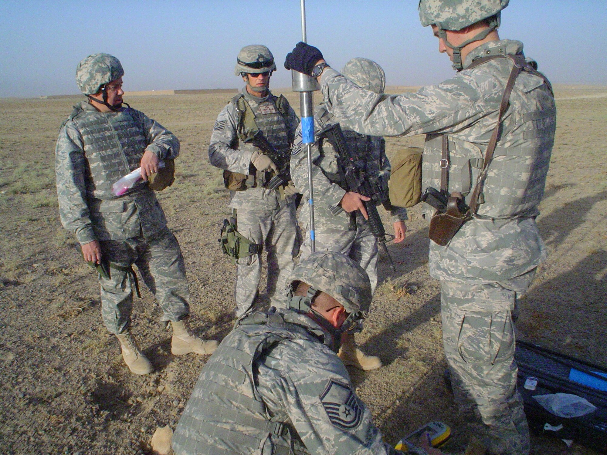 U.S. Air Force AMLOS work with members of Red Horse to evaluate the
possibility of establishing a new Landing Zone in Afghanistan. In addition
to communicating airlift needs for ground forces, AMLOs also help in
surveying and assessing landing zones and drop zones for safe and
sustainable operations. 