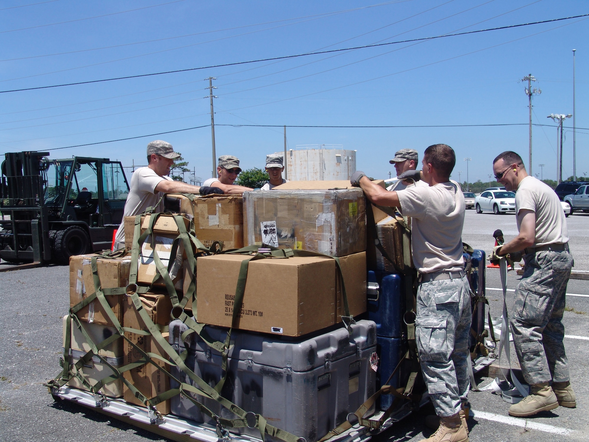 The Tan Team builds a pallet as part of the 96th Logistic Readiness Squadron's ROADEO June 11. (USAF photo/Lois Walsh)