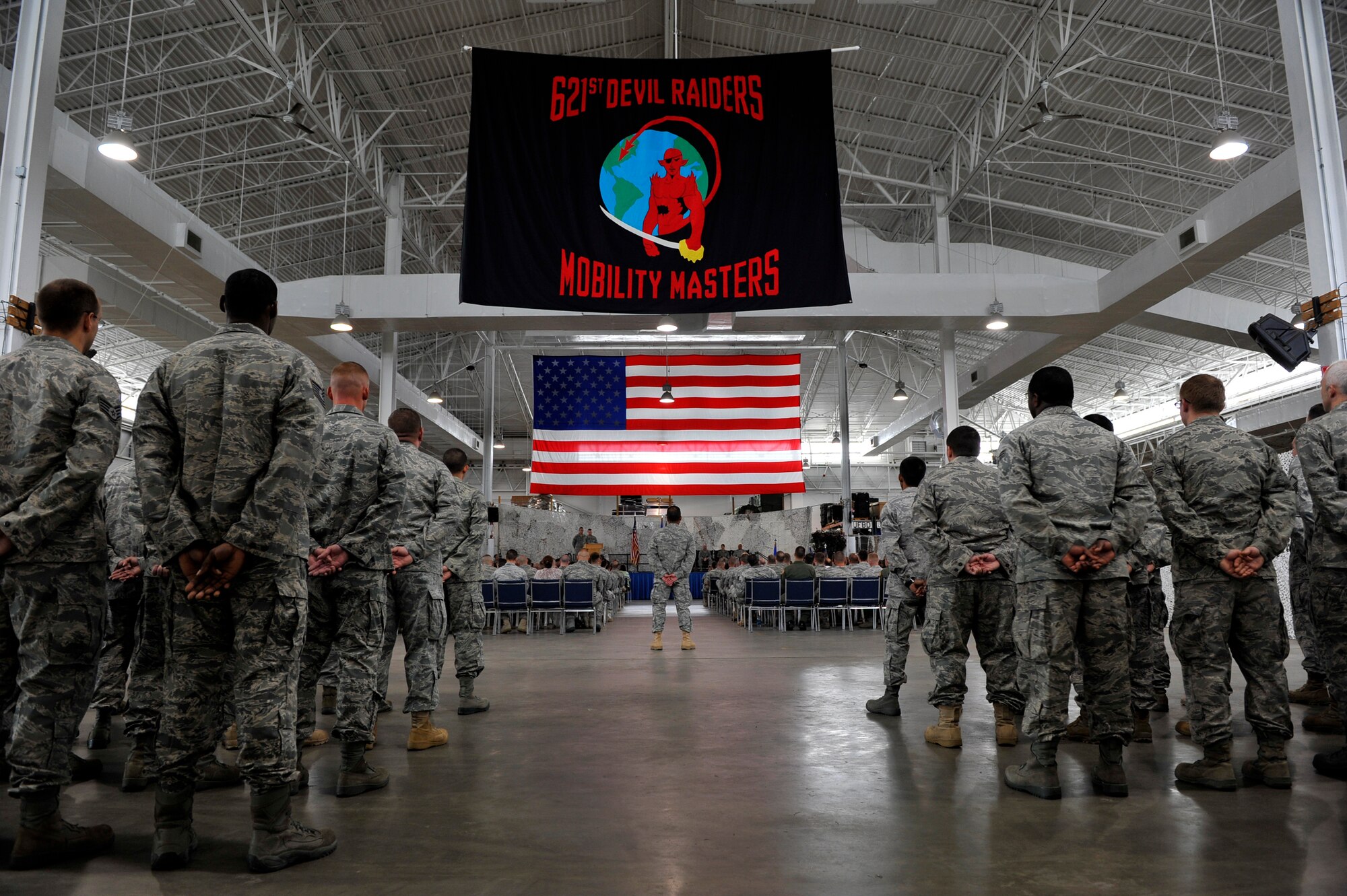 JOINT BASE MCGUIRE-DIX-LAKEHURST, N.J. – Members of the 816th Contingency Response Group, 621st Contingency Response Wing, observe its inactivation ceremony at the CRW Global Reach Deployment Center here June 11. The inactivation is part of an Air Force ordered restructuring that boosts the capabilities of the wing’s remaining groups and assists the creation of an Air National Guard CRG.  (U.S. Air Force photo/Tech. Sgt. Parker Gyokeres/released)