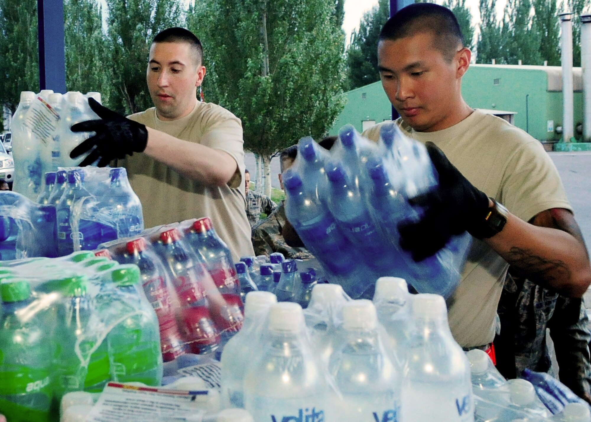 Transit Center at Manas Airmen load 31,000 pounds of food onto a pallet at the Manas International Airport for transportation to Osh, Kyrgyzstan, June 13, 2010. The Transit Center, together with the U.S. Department of State, food, fuel, and water totaling more than 31,000 pounds for a humanitarian assistance delivery to the southern region of Osh.  (U.S. Air Force photo/ Senior Airman Nichelle Anderson/ released)