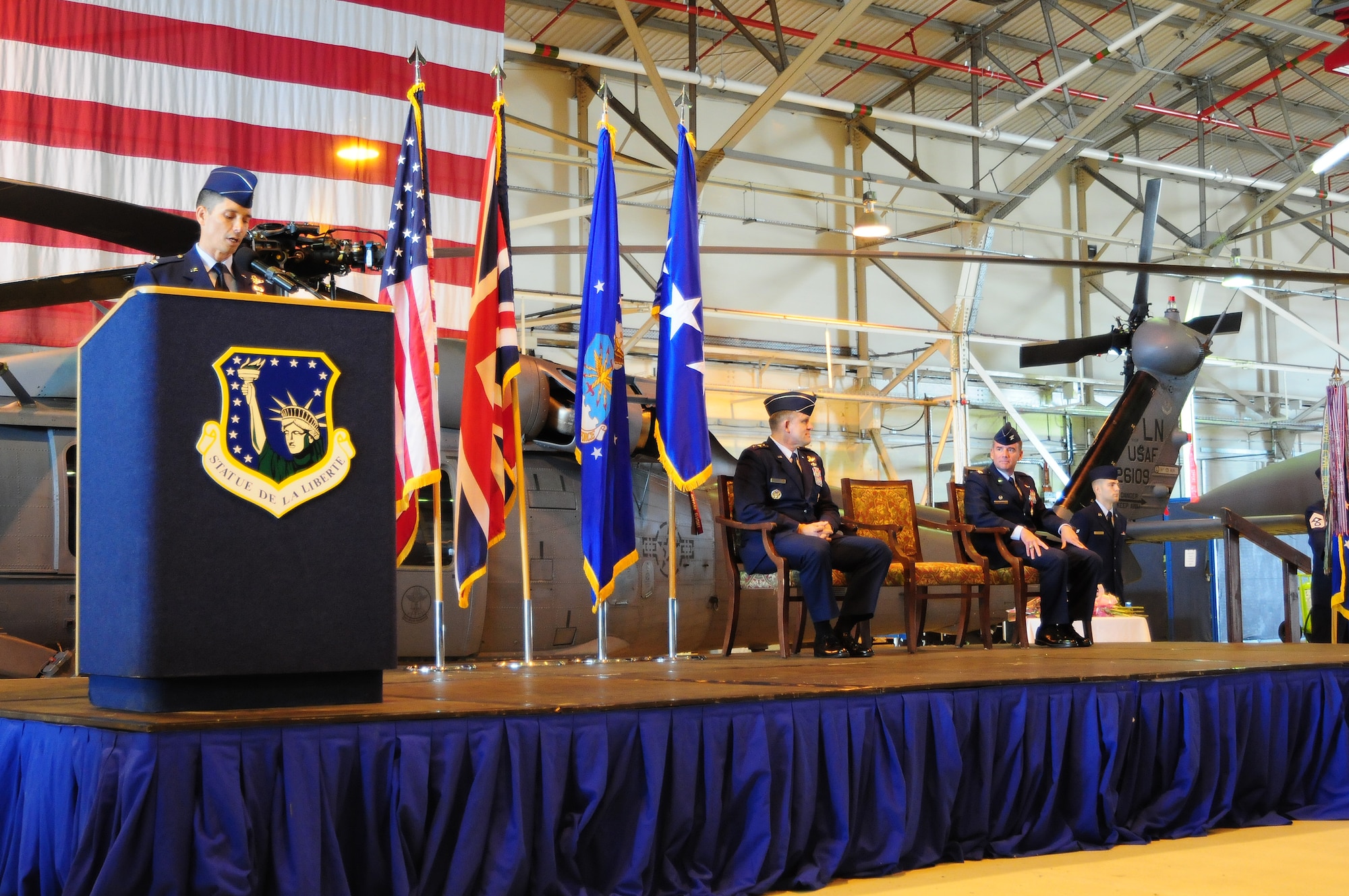 Col. John Quintas speaks to the 48th Fighter Wing after assuming command June 14 in Hangar 7. Colonel Quintas assumed command of the 48 FW after serving as commander of the 48th Operations Group for the past two years. (U.S. Air Force photo/Airman 1st Class Lausanne Morgan)
