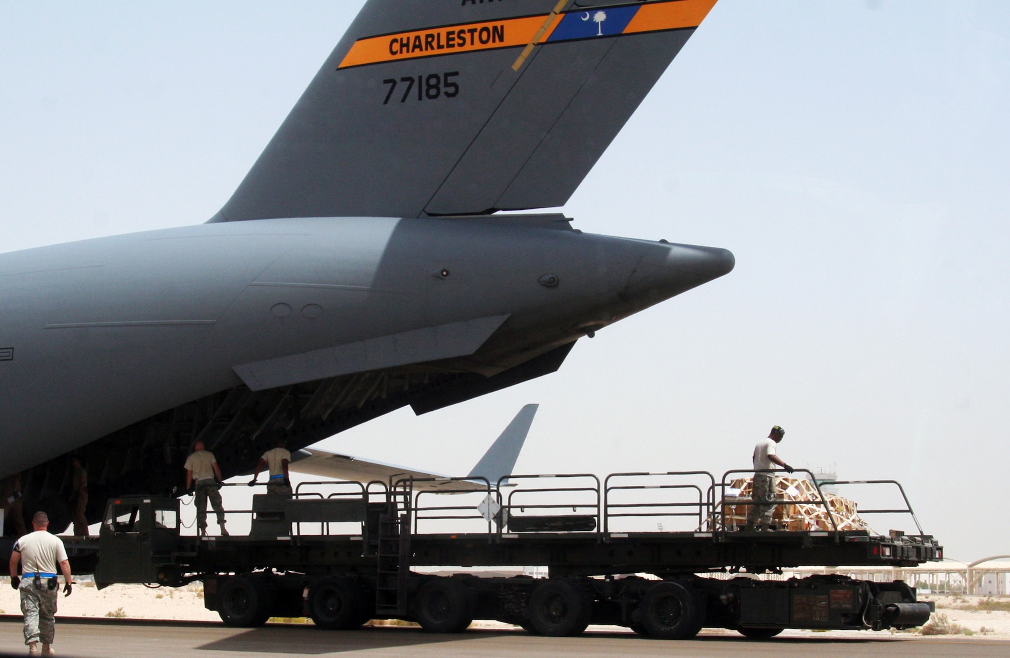 Air transportation Airmen from the 380th Expeditionary Logistics Readiness Squadron's Air Terminal Operations Center work on the flightline during operations for the 380th Air Expeditionary Wing at a non-disclosed base in Southwest Asia on  May 19, 2010. The 380th AEW supports operations Iraqi Freedom and Enduring Freedom and the Combined Joint Task Force-Horn of Africa. All air transportation Airmen deployed with the 380th AEW are deployed from the 89th Aerial Port Squadron at Joint Base Andrews, Md. (U.S. Air Force Photo/Master Sgt. Scott T. Sturkol/Released)