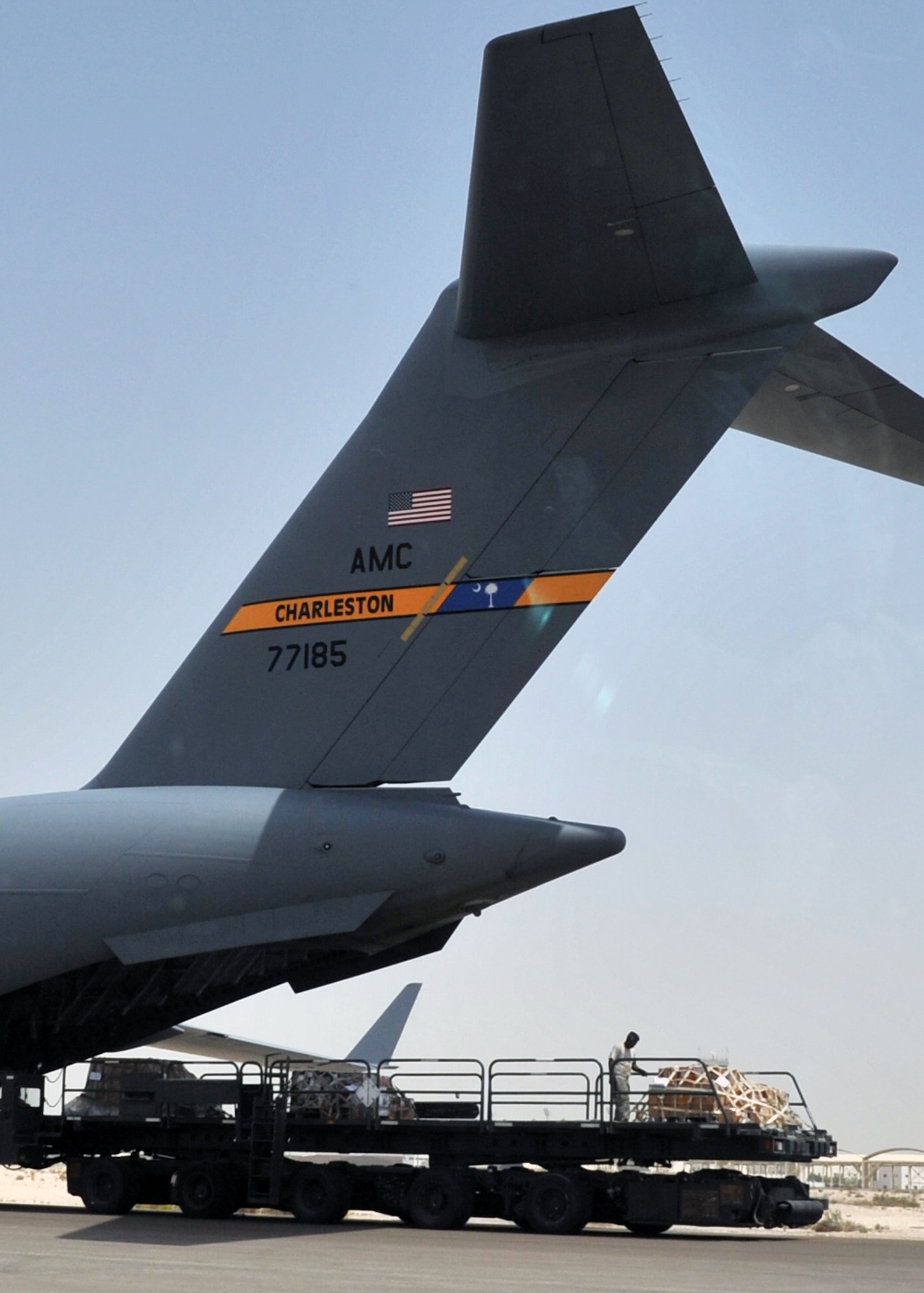 Air transportation Airmen from the 380th Expeditionary Logistics Readiness Squadron's Air Terminal Operations Center work on the flightline during operations for the 380th Air Expeditionary Wing at a non-disclosed base in Southwest Asia on  May 19, 2010. The 380th AEW supports operations Iraqi Freedom and Enduring Freedom and the Combined Joint Task Force-Horn of Africa. All air transportation Airmen deployed with the 380th AEW are deployed from the 89th Aerial Port Squadron at Joint Base Andrews, Md. (U.S. Air Force Photo/Master Sgt. Scott T. Sturkol/Released)