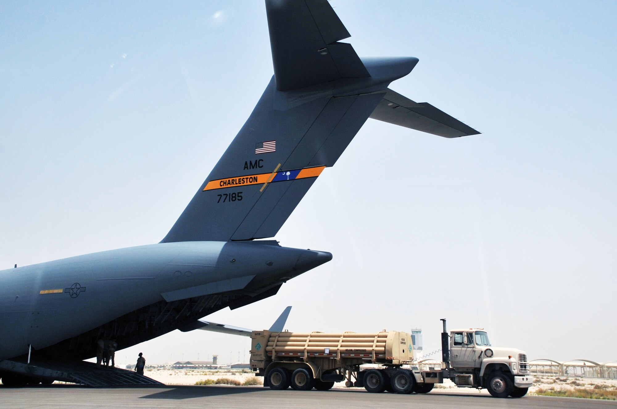 Air transportation Airmen from the 380th Expeditionary Logistics Readiness Squadron's Air Terminal Operations Center work on the flightline during operations for the 380th Air Expeditionary Wing at a non-disclosed base in Southwest Asia on  May 19, 2010. The 380th AEW supports operations Iraqi Freedom and Enduring Freedom and the Combined Joint Task Force-Horn of Africa. All air transportation Airmen deployed with the 380th AEW are deployed from the 89th Aerial Port Squadron at Joint Base Andrews, Md. (U.S. Air Force Photo/Master Sgt. Scott T. Sturkol/Released)
