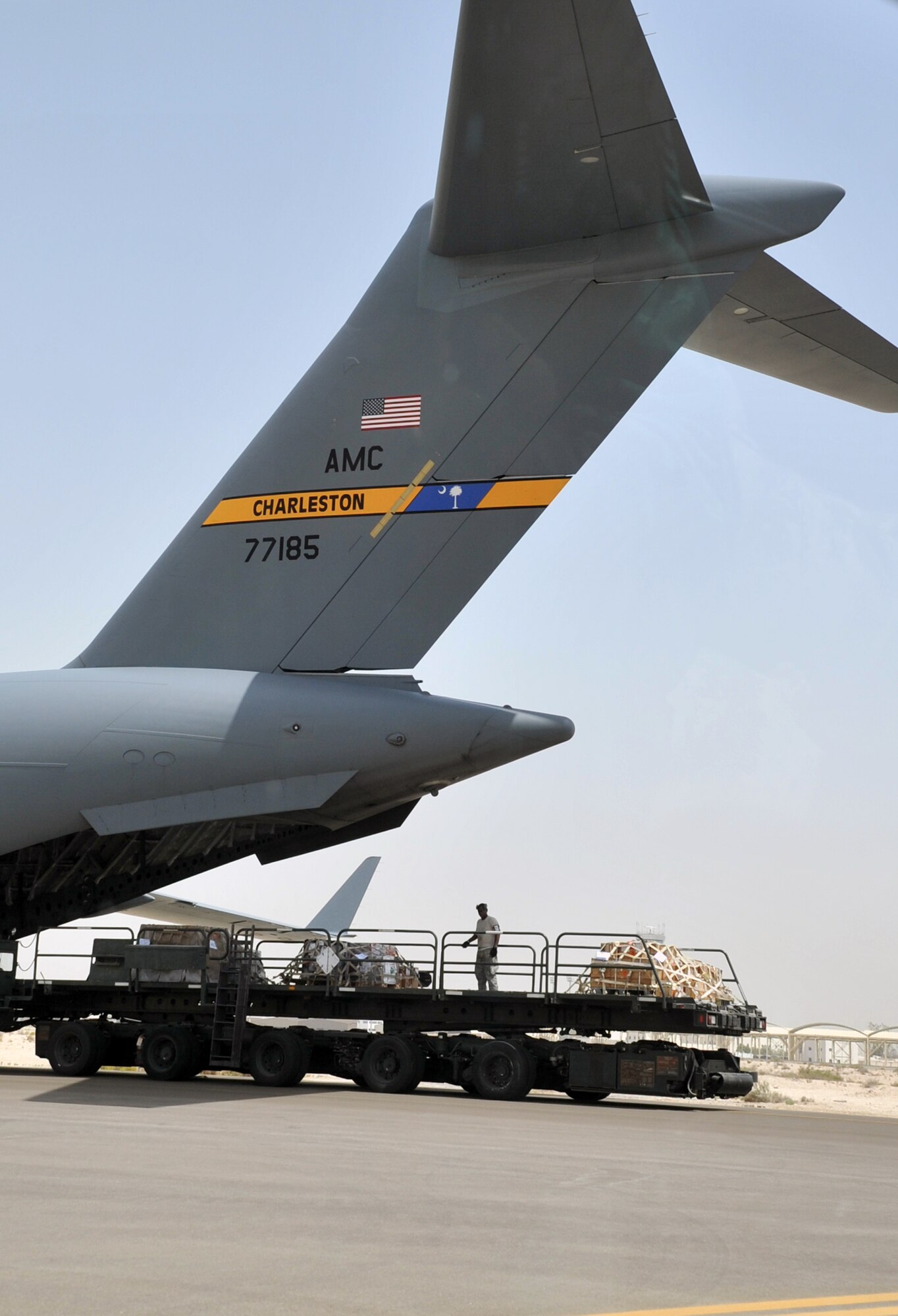 Air transportation Airmen from the 380th Expeditionary Logistics Readiness Squadron's Air Terminal Operations Center work on the flightline during operations for the 380th Air Expeditionary Wing at a non-disclosed base in Southwest Asia on  May 19, 2010. The 380th AEW supports operations Iraqi Freedom and Enduring Freedom and the Combined Joint Task Force-Horn of Africa. All air transportation Airmen deployed with the 380th AEW are deployed from the 89th Aerial Port Squadron at Joint Base Andrews, Md. (U.S. Air Force Photo/Master Sgt. Scott T. Sturkol/Released)