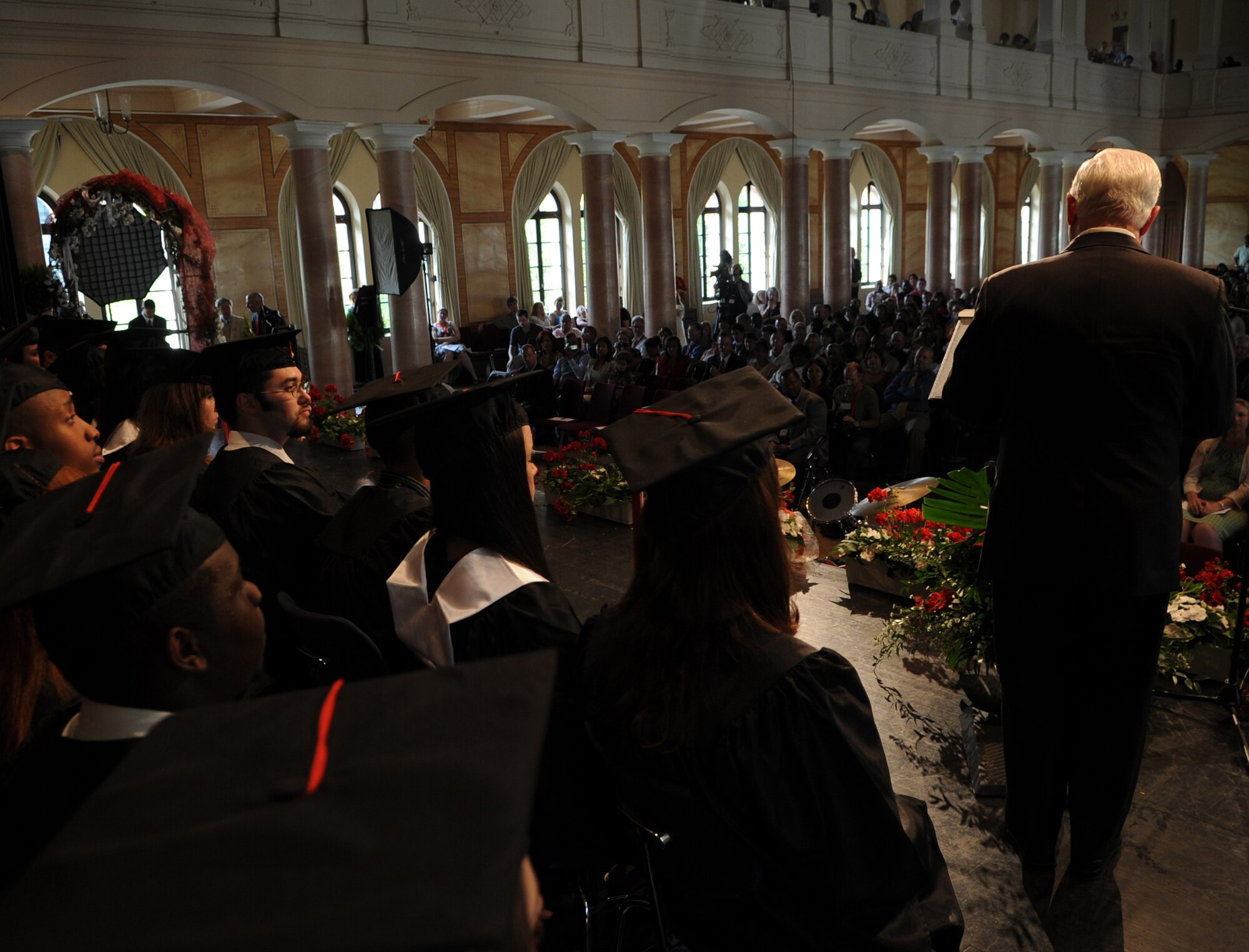 Secretary of Defense Robert M. Gates addresses attendees at the Kaiserslautern High School graduation ceremony, Kaiserslautern, Germany, June 11, 2010.  Secretary Gates accepted the student body's invitation to be the commencement speaker, honoring the many graduates that are also military dependents. (U.S. Air Force photo by Airman 1st Class Caleb Pierce)