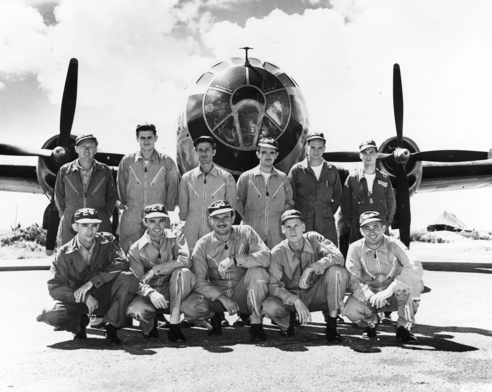 Crew of "Command Decision:" (standing, left to right) Tech. Sgt. Carl W. Ayers, flight engineer; Sgt. Stanley Smigel, radio operator; **Staff Sgt. Michael R. Martoochia, central fire control; Sgt. John J. Nally, left gunner; *PFC Henry E. Ruch, right gunner; **Sgt. Merle A. Goff, tail gunner; (kneeling, left to right) Capt. Donald M. Covic, aircraft commander; Capt. David A. Self Jr., pilot; Lt. Daniel M. Price, navigator; 1st Lt. William M. Hammond, bombardier; 1st Lt. Bernard G. Stein, radar observer. (*Denotes number of MiGs shot down) (U.S. Air Force photo)