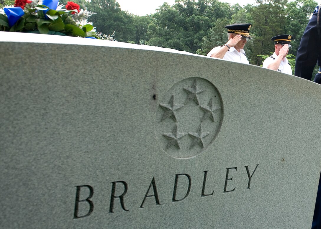 Army Chief of Staff Gen. George W. Casey Jr., left, and Sgt. Maj. of the Army Kenneth O. Preston, salute the gravesite of a former chief of staff of the Army after presenting a wreath at Gen. Omar Bradley's gravesite on the Army's 235th birthday in Arlington National Cemetery, Va., June 14, 2010.