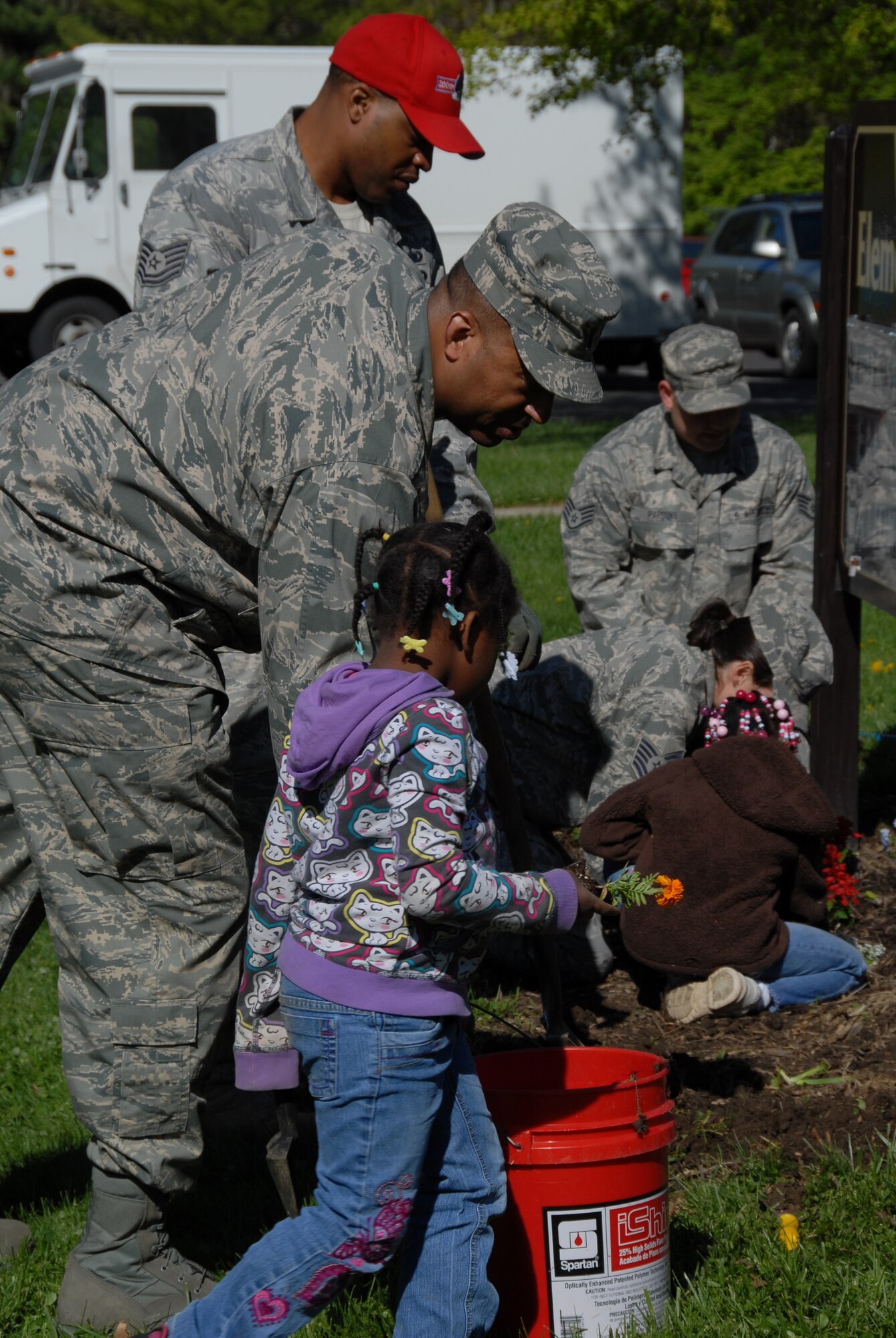 Members of the 179th Airlift Wing volunteer their time to the local community by cleaning up parks and rivers, and landscaping around schools. The annual community service is to celebrate Earth Day. This years event was held at various Mansfield area schools and other public areas on April 28, 2010.(U.S. Air Force photo by SRA Joseph Harwood) (RELEASED)