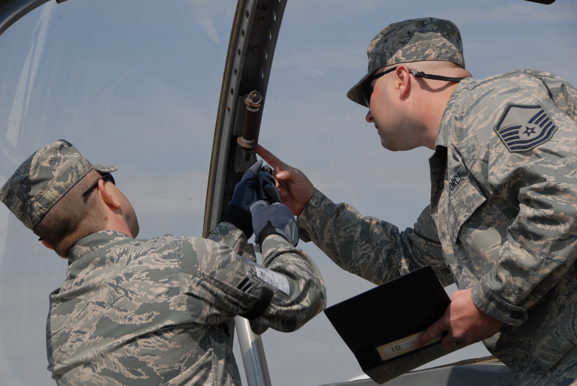 A1C Daniel L. Thompson and MSgt Jeffrey E. Fuller are shown training on April 17, 2010.The 179th Airlift Wing Maintenance Squadron is training with a retired  T-37 B "Tweety Bird".(U.S. Air Force photo by SrA Joseph Harwood) (RELEASED)