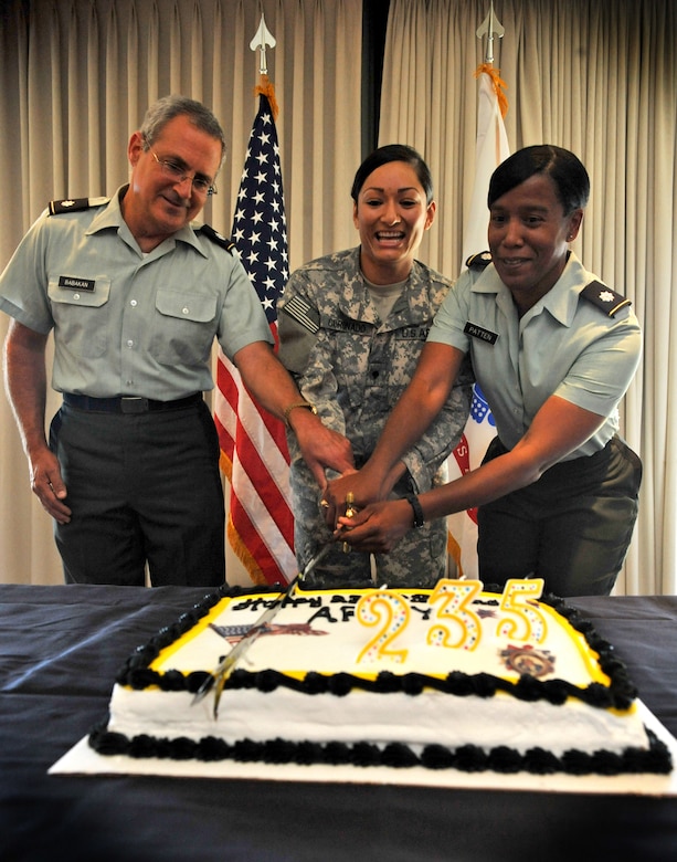 VANDENBERG AIR FORCE BASE, Calif. - Lt. Col. Mark Babakan, from the Joint Functional Component Command for Space, Spc. Ashlyn Coronado, from the 535th Headquarters Brigade, and Lt. Col. Jacqueline Patten, also from JFCC Space, cut into a cake to celebrate the United States Army’s 235th birthday. (U.S. Air Force photo/Senior Airman Andrew Lee)