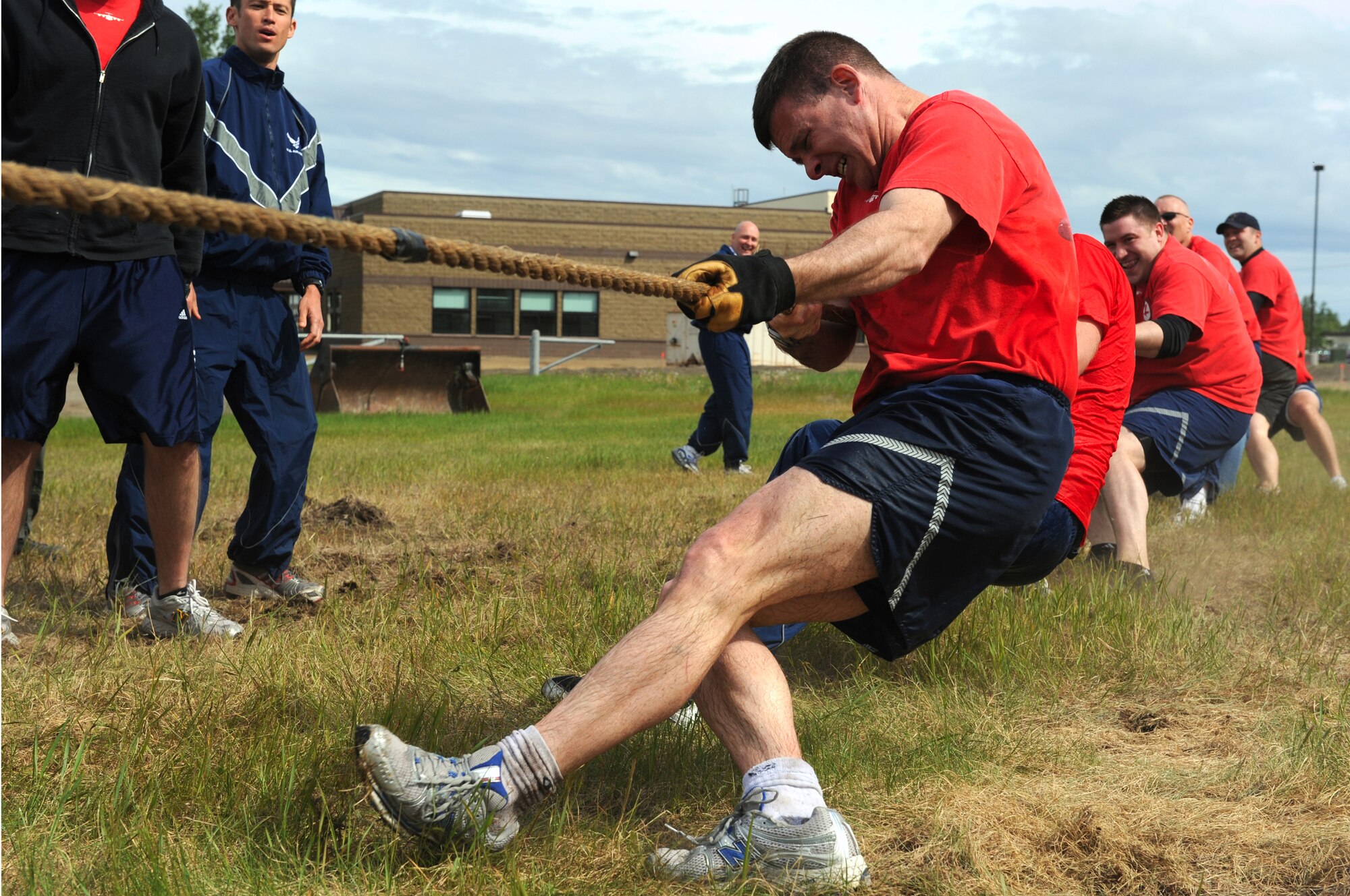 Members of the 517th Airlift Squadron pull the tug-o-war rope during the Arctic Warrior Olympics, June 11. The Arctic Warrior Olympics are held every June to bring the community on Joint Base Elmendorf-Richardson together. (Air Force photo by Senior Airman Cynthia Spalding)
