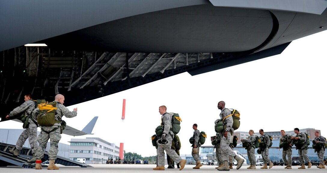 U.S. Air Force Airmen and U.S. Army Soldiers board a C-17 Globemaster III at Ramstein Air Base, Germany, for an airborne jump June 14, 2010. Five NATO countries participated in the annual event to support one of U. S. Air Forces in Europe's top priorities, building partnerships. (U.S. Air Force photo/Airman 1st Class Grovert Fuentes-Contreras)