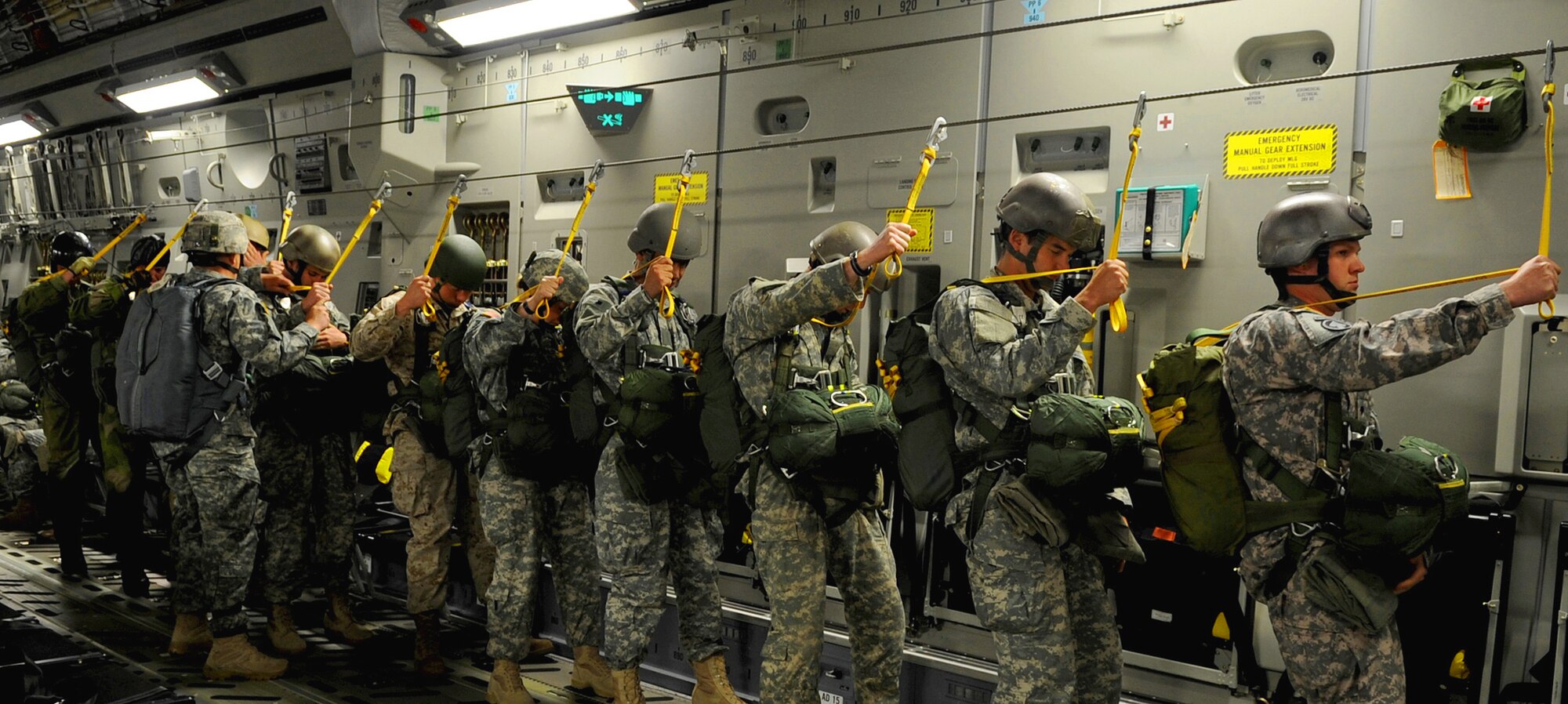 Airmen, Soldiers and Norwegian soldiers prepare to execute an airborne jump from a C-17 Globemaster III June 15, 2010 over Alzey, Germany. (U.S. Air Force photo/Airman 1st Class Grovert Fuentes-Contreras)