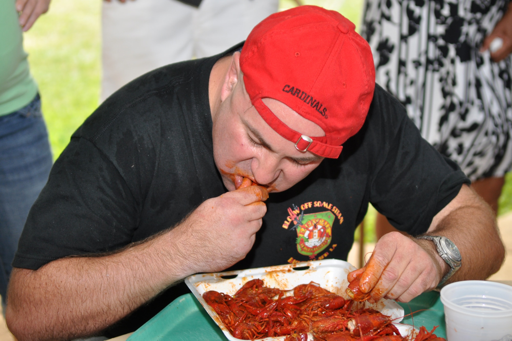 Frank Copeland, marketing assistant, 2nd Force Support Squadron, chows down on some Louisiana “mudbugs” while competing in a crawfish eating contest at the Barksdale Crawfish Festival on Barksdale Air Force Base, La., June 11, 2010.  Hundreds of people enjoyed the “blow off some steam” event, which featured crawfish racing, crawfish eating contests for both kiddies and adults, door prizes and live Zydeco music performed by the Red River Playboys from Shreveport, La. (U.S. Air Force photo/Tech. Sgt. Jeff Walston)