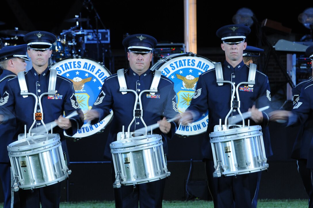 The United States Air Force Band's Ceremonial Drum Corps performs during the Conference of American Air Chiefs Twilight Tattoo June 13 at the U.S. Air Force Ceremonial Lawn on Bolling Air Force Base. Gen. Norton A. Schwartz, U.S. Air Force chief of staff, hosted the event celebrating "50 Years of Friendship and Cooperation" between nations belonging to the System of Cooperation among American Air Forces. (U.S. Air Force photo by Thomas Dennis)