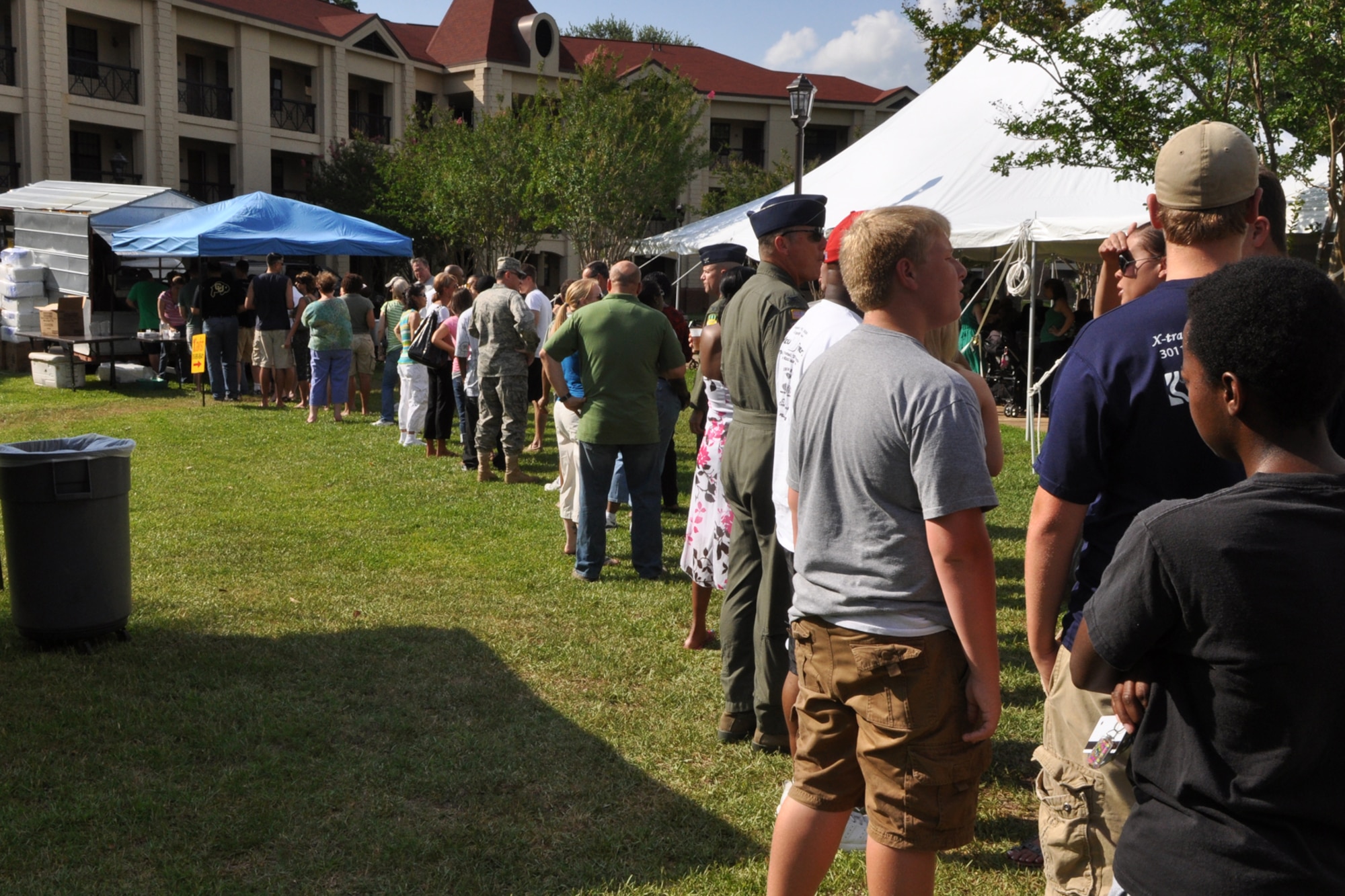 The line for crawfish continues to grow at the Barksdale Crawfish Festival at Barksdale Air Force Base, La., June 11, 2010. Hundreds of people enjoyed the “blow off some steam” event, which featured crawfish racing, crawfish eating contests for both the kiddies and adults, door prizes and live Zydeco music performed by the Red River Playboys from Shreveport, La. (U.S. Air Force photo/Tech. Sgt. Jeff Walston)