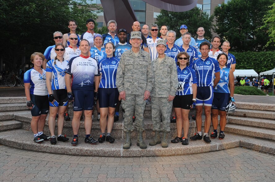 Gen. Norton Schwartz, U.S. Air Force chief of staff, and Maj. Gen. Darrell D. Jones, Air Force District of Washington commander, pose with the Air Force Cycling team before the 2010 Air Force Cycling Classic June 13, 2010 in Crystal City, Va. (U.S. Air Force photo by Staff Sgt Melissa Stonecipher). 
