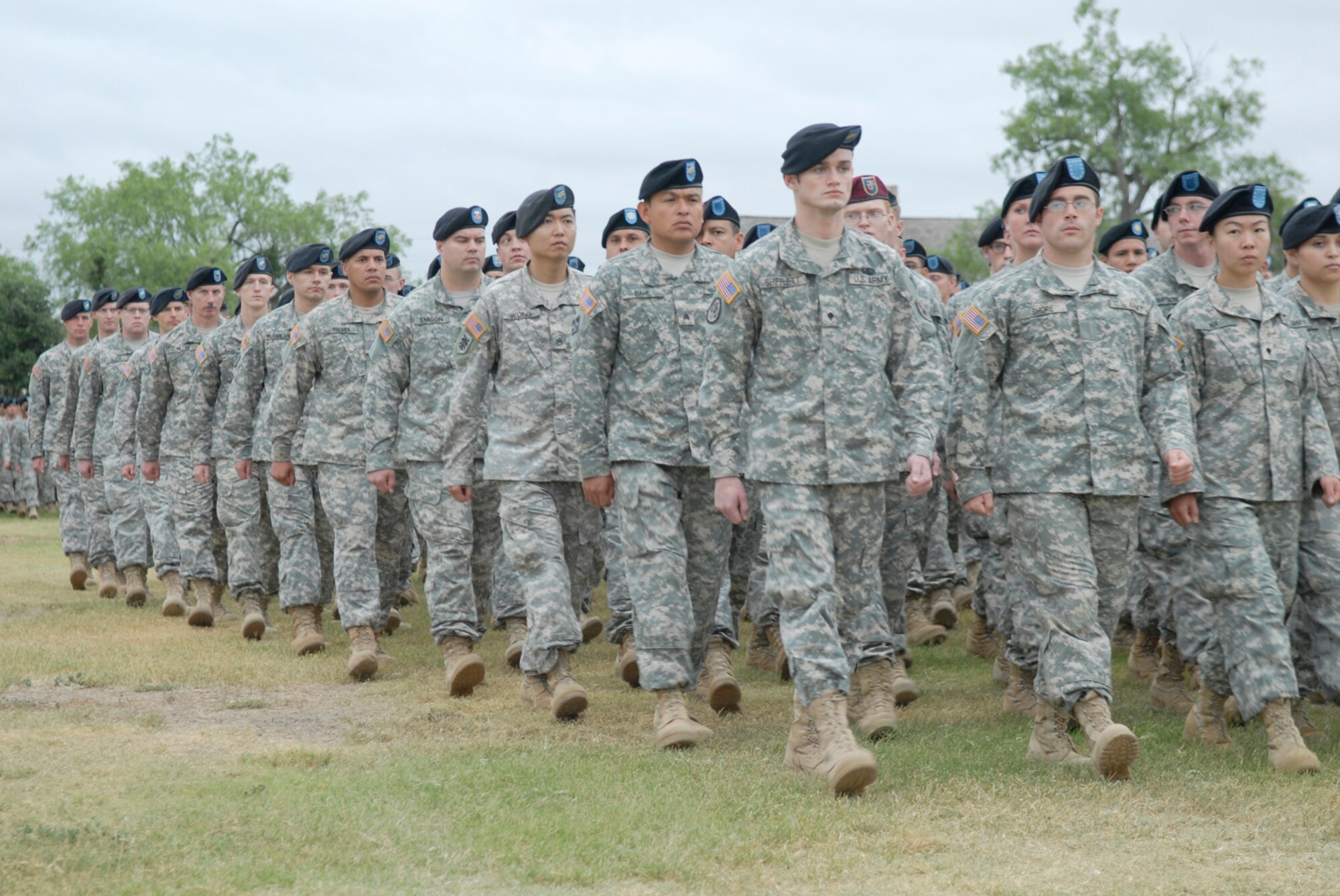 SAN ANGELO, Texas -- Soldiers from the 344th Military Intelligence Battalion perform a pass and review during the change of command ceremony, June 15, 2010. The 344th MIBN is a tenant command located on Goodfellow Air Force Base. The ceremony took place at Fort Concho National Historic Landmark. (U.S. Air Force photo/Lou Czarnecki)

