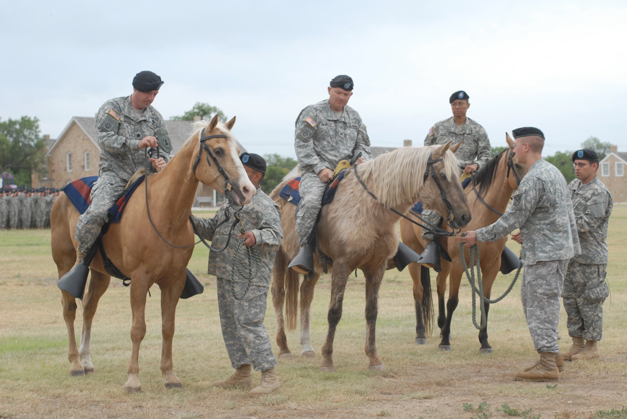 SAN ANGELO, Texas -- Army Lt. Col. Bichson Bush mounts up for her final inspection of the 344th Military Intelligence Battalion as commander during the change of command ceremony, June 15, 2010. Colonel Bush was accompanied by the reviewing officer Col. Thomas Miller (middle) and the incoming commander, Lt. Col. John Bonin. Colonel Miller is the commander of the 111th Military Intelligence Brigade, Fort Huachuca, Arizona. The 344th MIBN is a tenant command located on Goodfellow Air Force Base. The ceremony took place at Fort Concho National Historic Landmark. (U.S. Air Force photo/Staff Sgt. Laura R. McFarlane)
