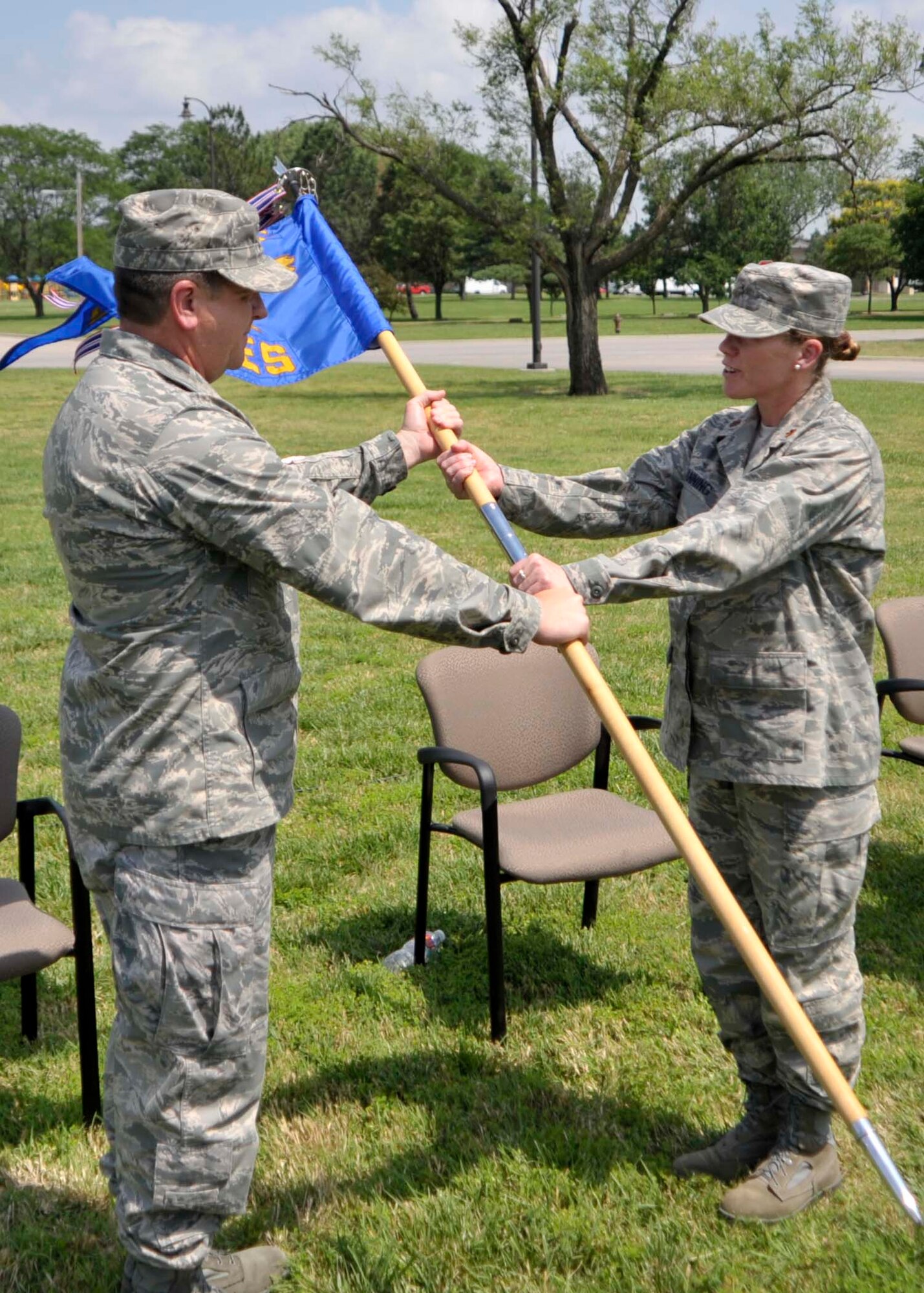 Maj. Erin Manning, 931st Civil Engineer Squadron commander, assumes command by accepthing the unit's guide-on from Col. Edsel Frye, Jr., 931st Air Refueling Group commander, here on June 12. Major Manning replaces newly pinned Col. Kimberly Thompson who accepted an assingment to 904th Civil Engineer Flight at March Air Reserve Base, Calif. to assist in setting up a newly established speciality engineering team. (U.S. Air Force Photo/Capt. Tim Wade)
