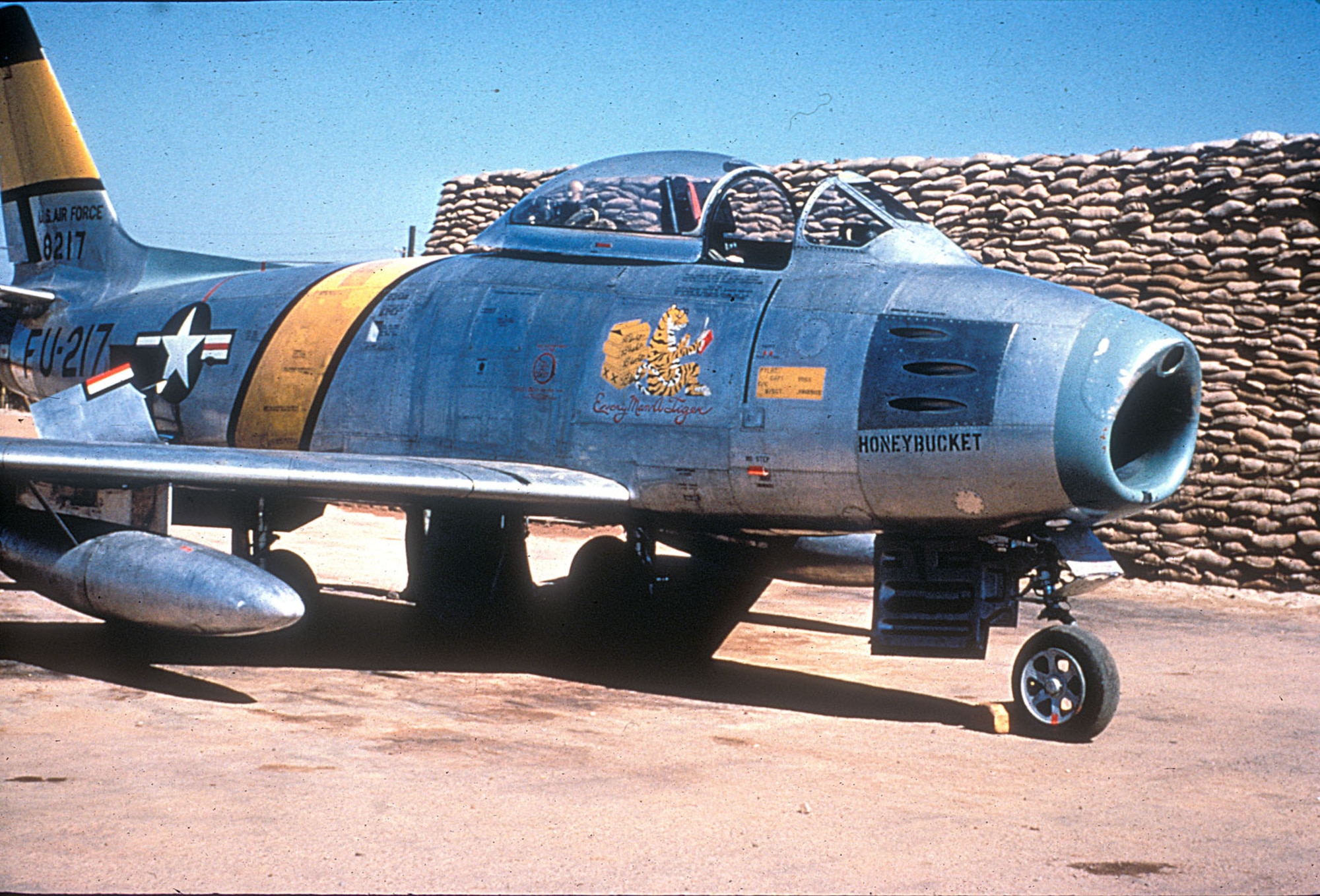 A few F-86 fighters were modified into RF-86 reconnaissance aircraft for dangerous unescorted missions over MiG Alley. Shown here in 1952, RF-86A "Honeybucket" was lost on a later mission. (U.S. Air Force photo)