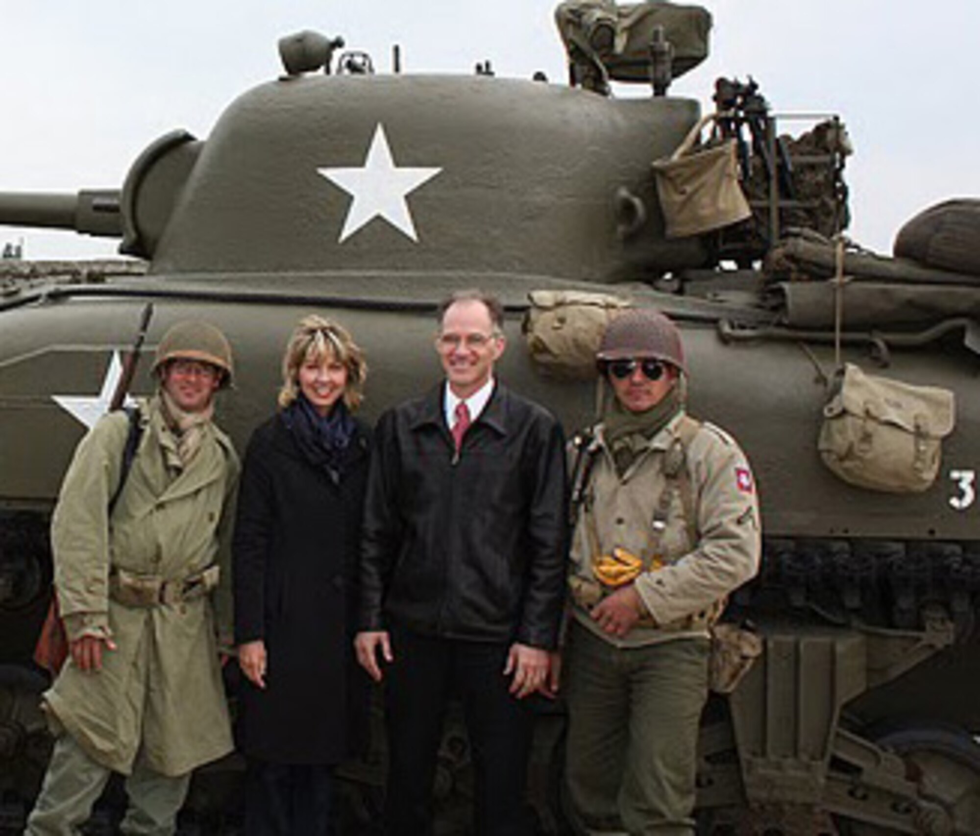Lt. Col. Kirk Rowe, and his wife, Christina, pose before a restored World War II tank during celebrations in Noirmoutier-en-I'lle, France.  The couple were part of a delegation that visited Crestview's sister city. (courtesy photo)