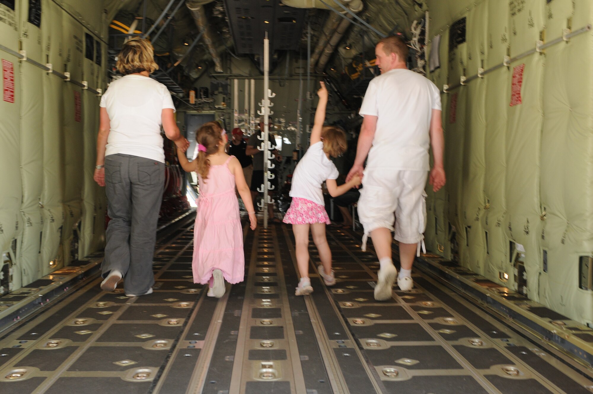 Visitors tour the C-130J Hercules during the 2010 Berlin International Aerospace Exhibition and Conferences June 10. The C-130 is one of Air Force’s main attractions during the Berlin Air Show. (U.S. Air Force photo/Staff Sgt. Julius Delos Reyes)