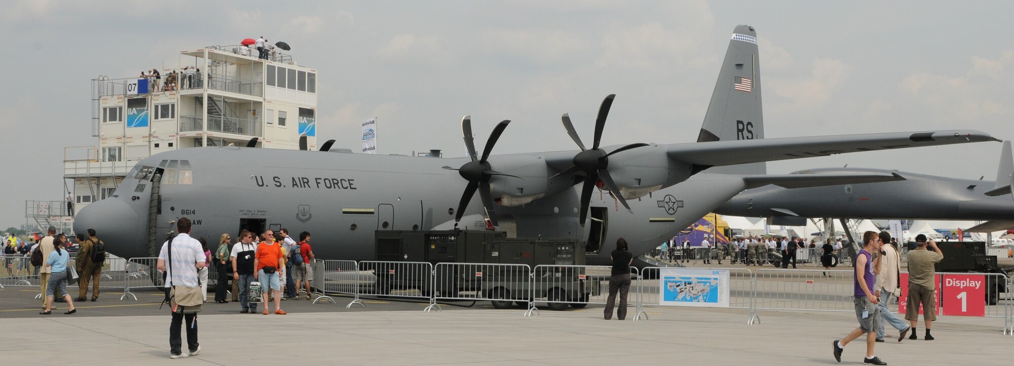 A C-130J Hercules from Ramstein Air Base, Germany, attracts visitors of the ILA 2010 Berlin International Aerospace Exhibition and Conferences June 10. The C-130 is one of Air Force’s main attractions during the Berlin Air Show. (U.S. Air Force photo/Staff Sgt. Julius Delos Reyes)