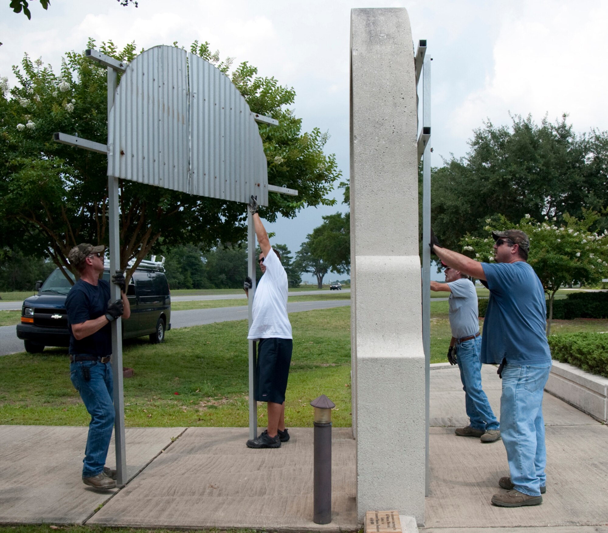 EGLIN AIR FORCE BASE, Fla. -- A crew from the 796th Civil Engineer Squadron boards up the All Veterans' Memorial during the base's hurricane exercise.  The week-long exercise prepares the base for hurricane season which runs from June 1 to Nov. 30. (USAF photo/Debbie Haussermann)