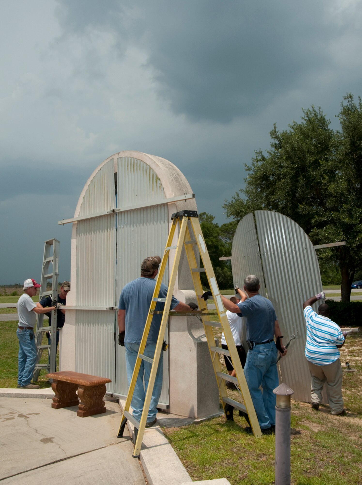 EGLIN AIR FORCE BASE, Fla. -- A crew from the 796th Civil Engineer Squadron boards up the All Veterans' Memorial during the base's hurricane exercise.  The week-long exercise prepares the base for hurricane season which runs from June 1 to Nov. 30. (USAF photo/Debbie Haussermann)