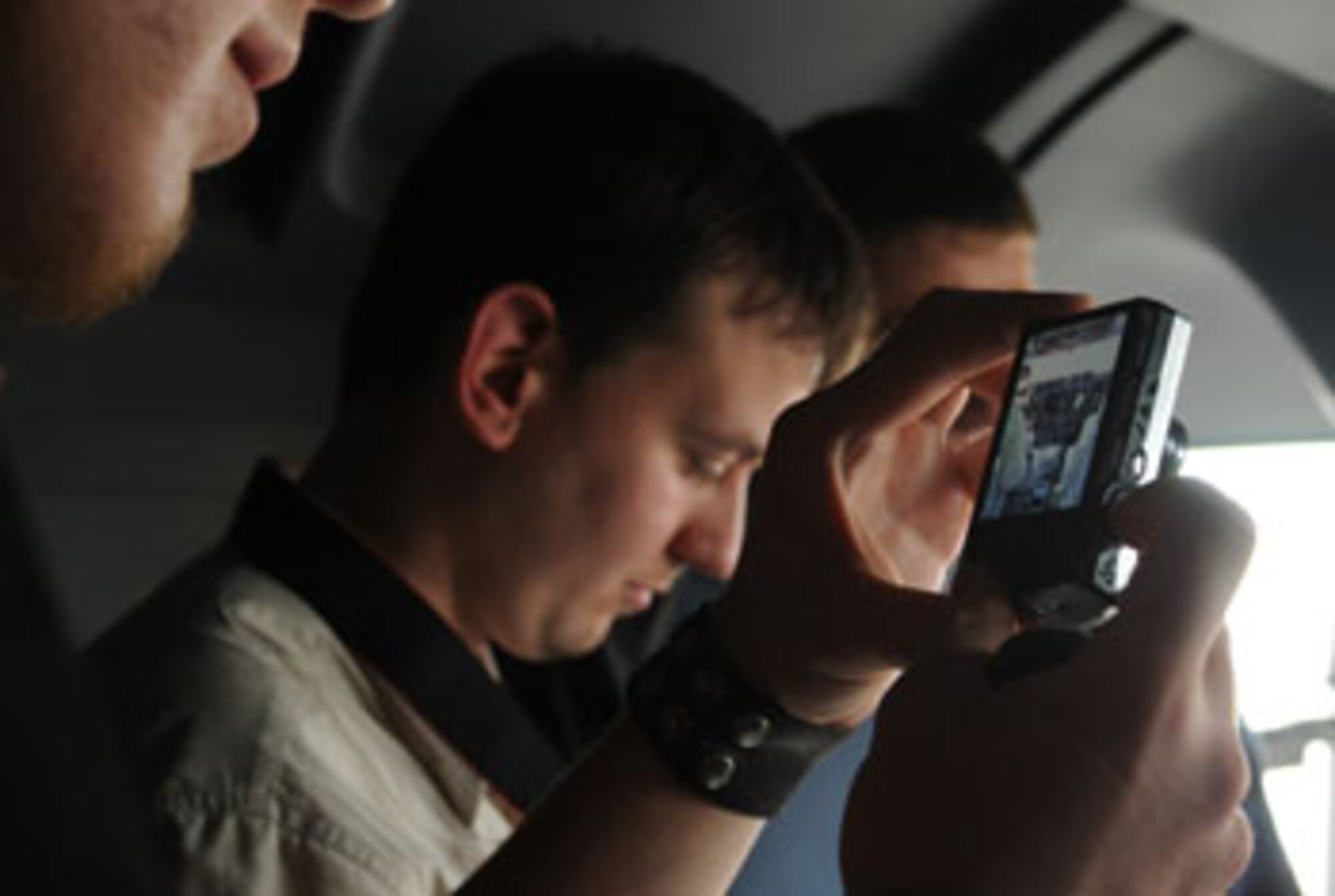 BERLIN, Germany — A visitor takes a photo of the C-130J Herculessâ? cockpit during the 2010 Berlin International Aerospace Exhibition and Conferences June 10. The Berlin Air Show is expected to attract more than 200,000 visitors. (U.S. Air Force photo by Staff Sgt. Julius Delos Reyes)
