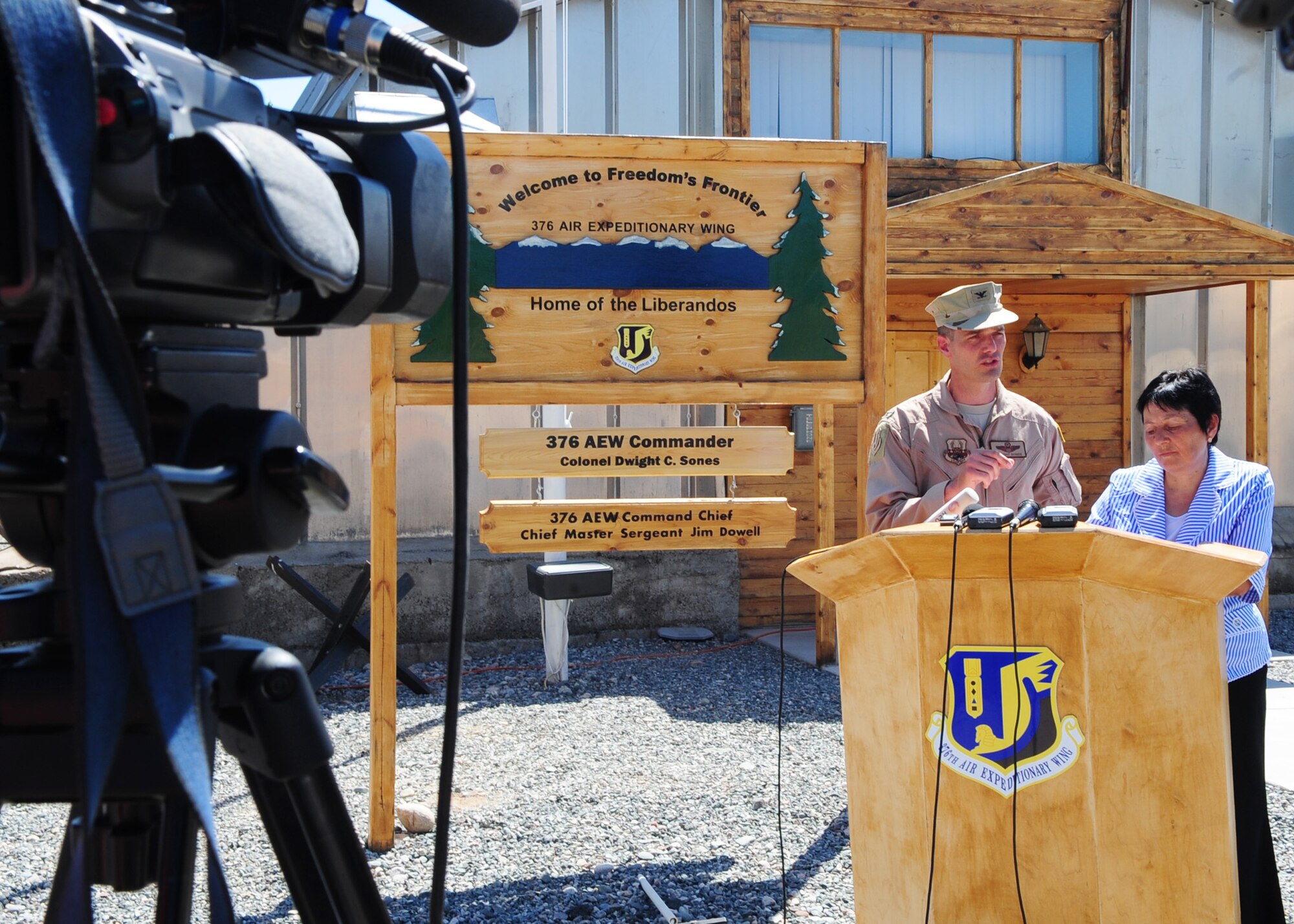 Col. Dwight C. Sones, 376th Air Expeditionary Wing commander, speaks to local and international media during a press conference following the change of command ceremony for the 376th AEW at the Transit Center at Manas, Kyrgyzstan, June 15, 2010. Colonel Sones was previously the Vice Commander, 436th Airlift Wing, Dover Air Force Base, Del. The primary purpose of a change of command ceremony is to allow subordinates to witness the formal transfer of total responsibility, authority, and accountability from one officer to another. (U.S. Air Force photo/ Senior Airman Nichelle Anderson/ released)