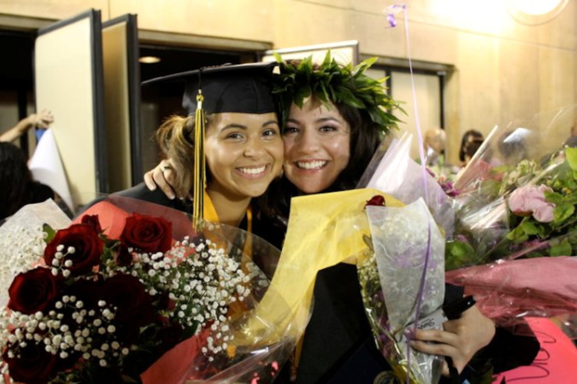 Kadena High School seniors Caitlen Miller and Clarissa Rendon were among the 179 students to celebrate graduation day at the Okinawa Civic Center June 11.The two seniors were part of student council this year. Rendon served as president and Miller as vice president. (Courtesy photo)