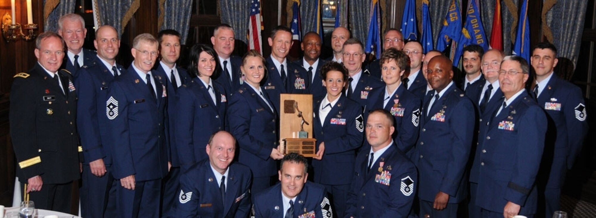 Members of the 179th Airlift Wing accepting the prestigious Alan P. Tappan Award at the 2010 Ohio Air National Guard Annual Awards Banquet.  (U.S. Air Force photo by SSgt Jodi Leninger) (RELEASED)