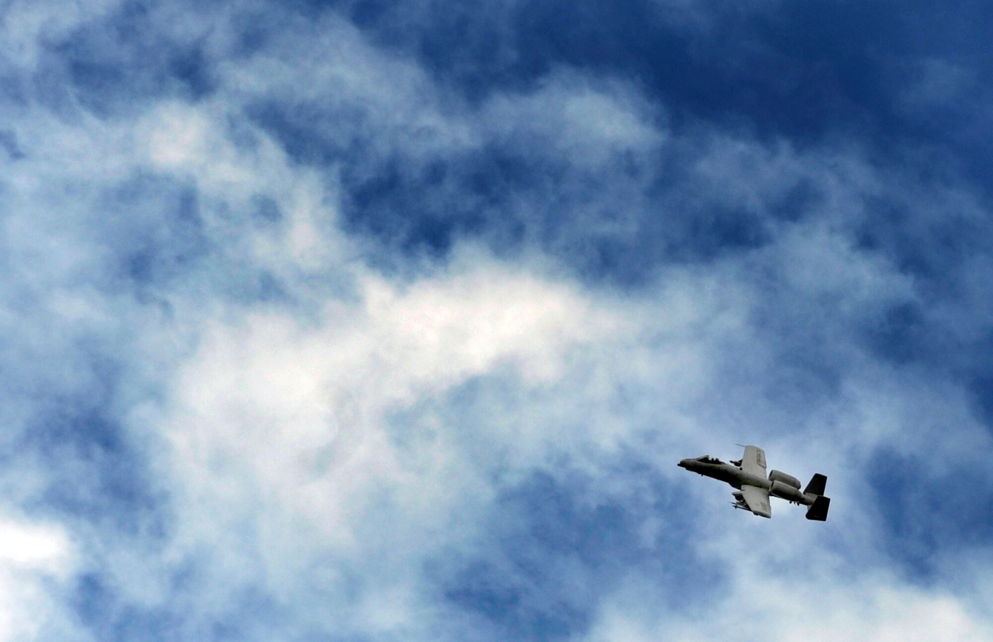 An A-10 Thunderbolt II flies overhead June 16, 2010, Eielson Air Force Base, Alaska. The A-10 was simulating a strafe run targeting mock FIM-92 Stingers. This training operation was part of the joint multinational exercise Red Flag - Alaska. (U.S. Air Force photo/Airman 1st Class Willard E. Grande II)