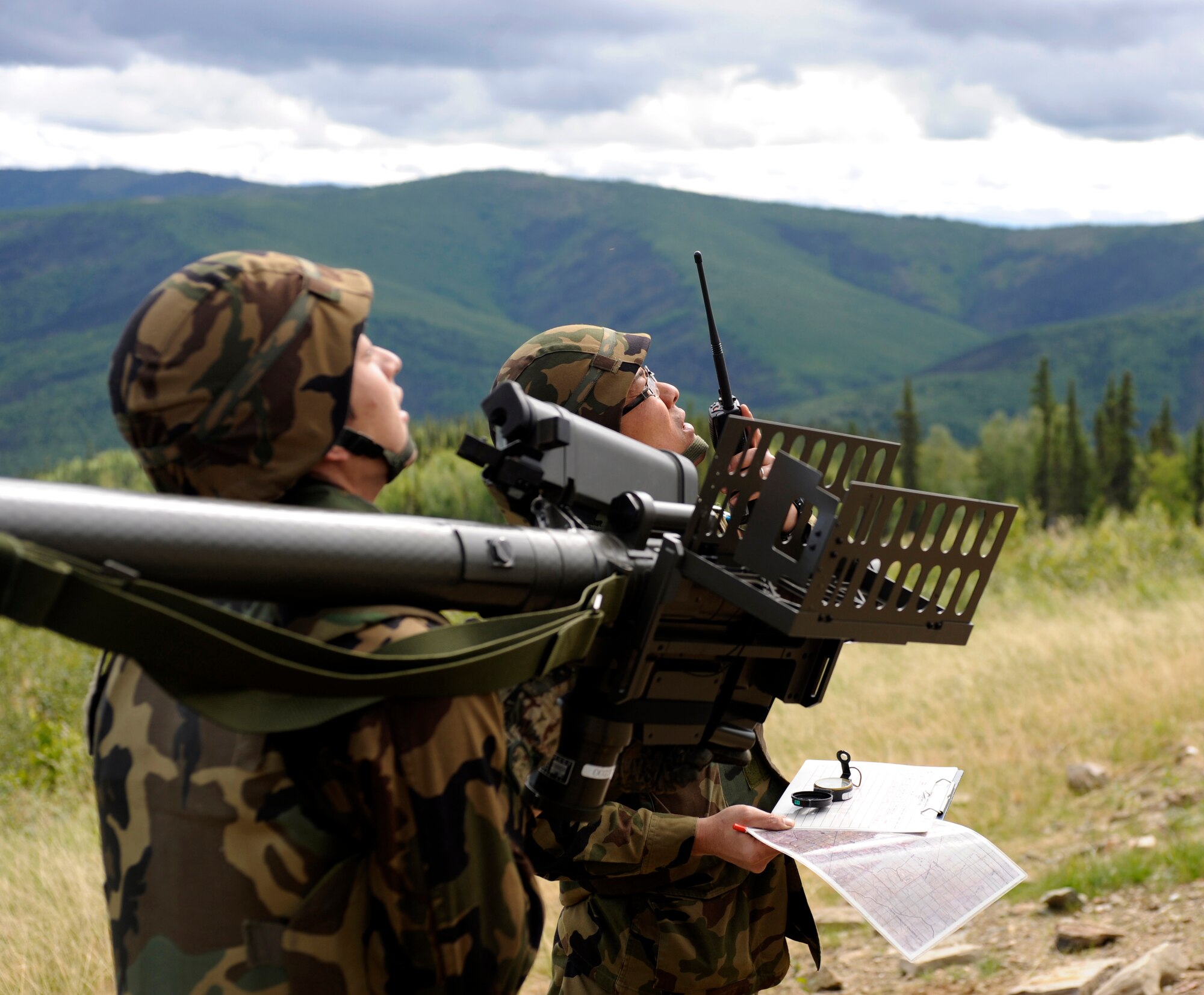 Japanese Air Self-Defense Force service members search for aircraft June 16, 2010, Eielson Air Force Base, Alaska. The JASDF members were firing mock surface-to-air missiles to train pilots how to react in case the encounter the situation in actual combat. This training operation was part of the joint multinational exercise Red Flag - Alaska. (U.S. Air Force photo/Airman 1st Class Willard E. Grande II)
