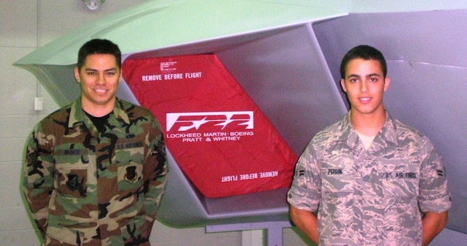 Staff Sgt. AlanMichael Warner (left) and Airman 1st Class Josiah Perrin, 365th Training Squadron graduates, are the F-22 Avionics course's first two Ace award winners. The maintained an average of 100 percent through eight blocks of instruction. Sergeant Warner will return to his home state serving at the 154th Maintenance Squadron at Hickam Air Force Base, Hawaii. Airman Perrin will become a member of the 27th Aircraft Maintenance Unit at Langley AFB, Va. (U.S. Air Force photo/Staff Sgt. David Hirsch)                             